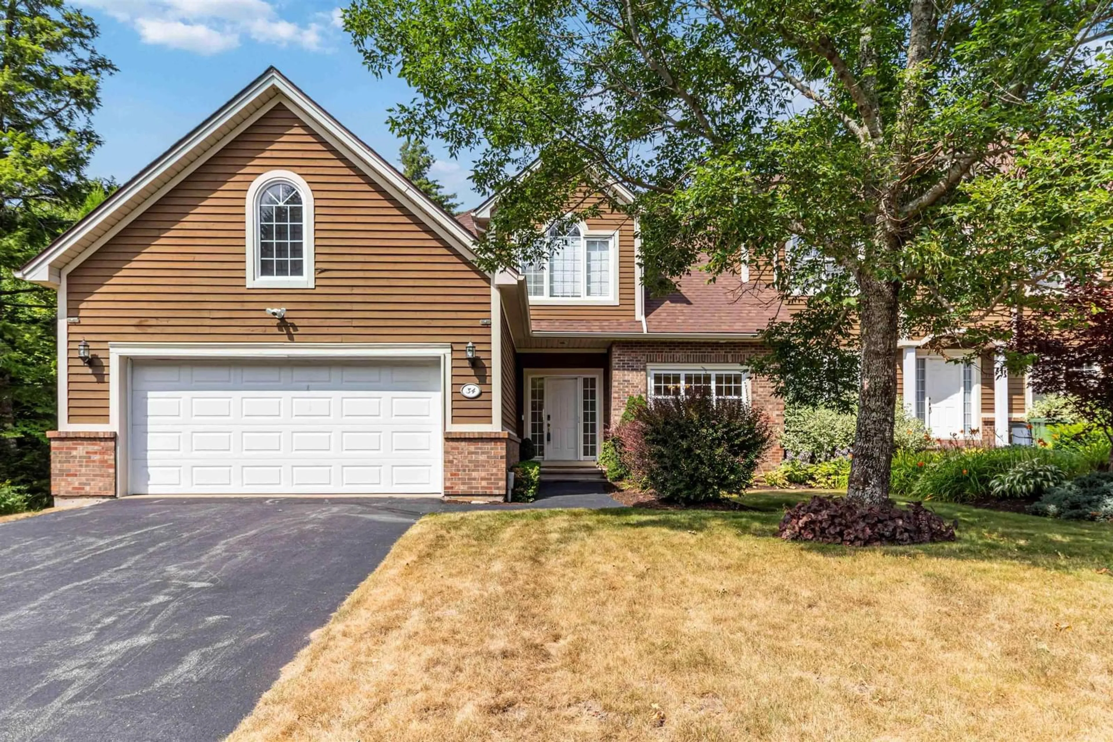 Home with brick exterior material, street for 34 Greenside Lane, Hammonds Plains Nova Scotia B4B 2A1