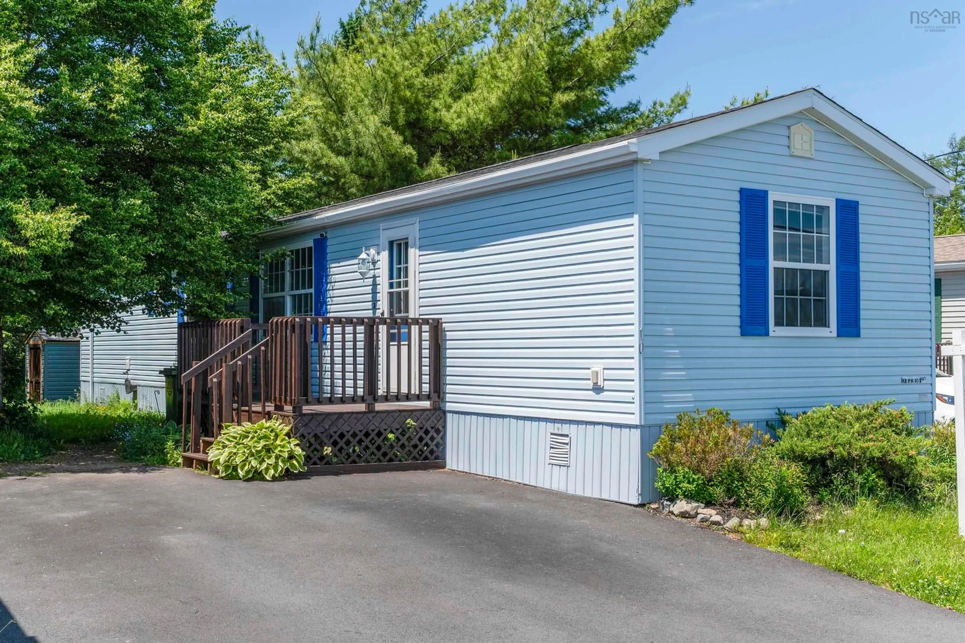 Home with vinyl exterior material, street for 10 Apple St, Dartmouth Nova Scotia B2W 4W2