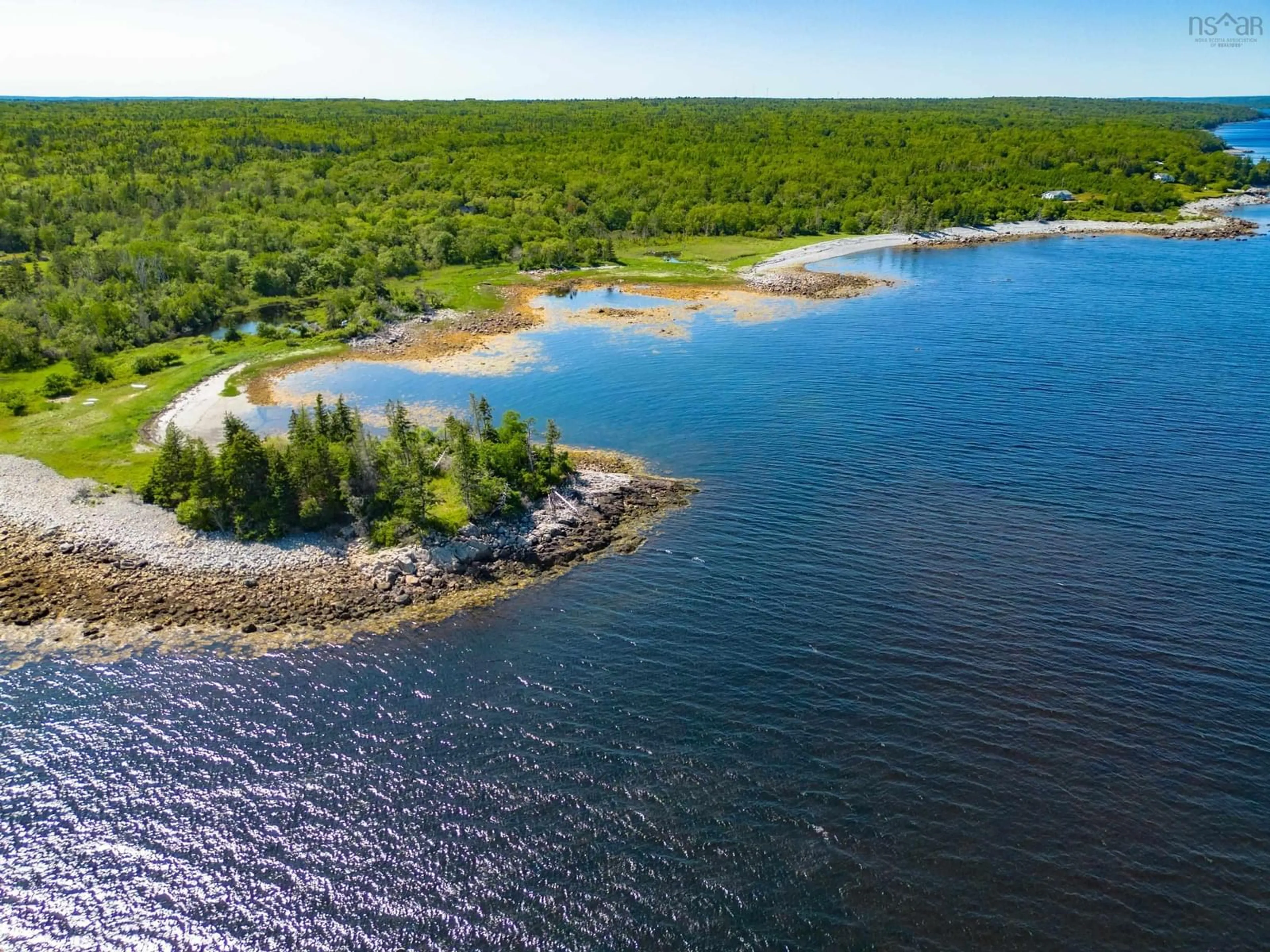 A pic from outside/outdoor area/front of a property/back of a property/a pic from drone, water/lake/river/ocean view for 4336 Sandy Point Rd, Jordan Bay Nova Scotia B0T 1W0