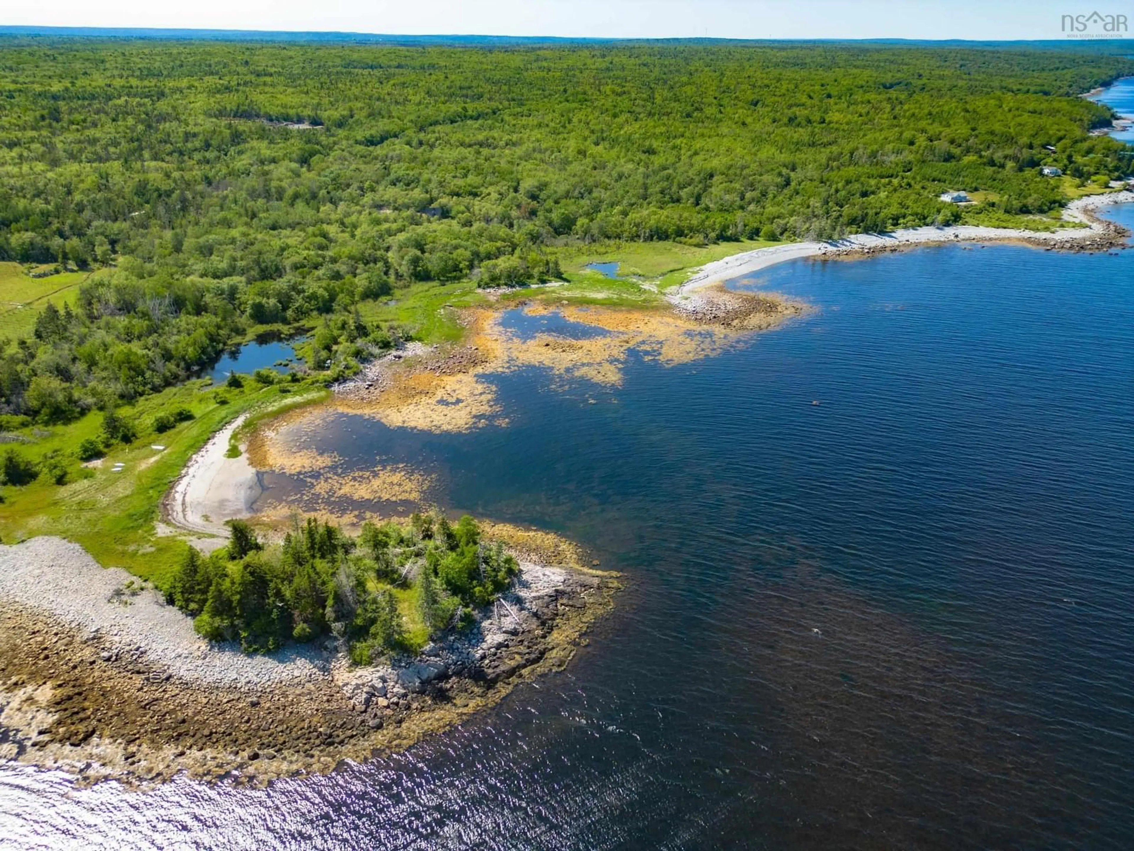 A pic from outside/outdoor area/front of a property/back of a property/a pic from drone, water/lake/river/ocean view for 4336 Sandy Point Rd, Jordan Bay Nova Scotia B0T 1W0