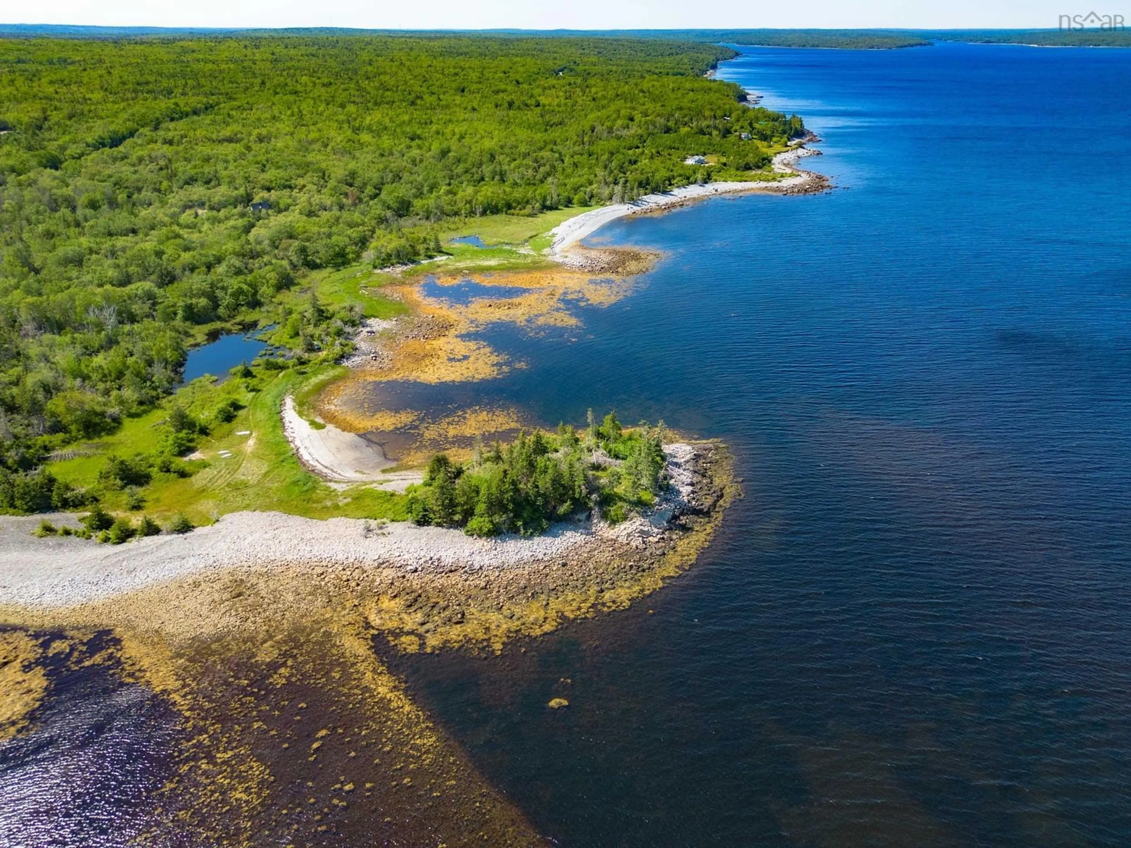 A pic from outside/outdoor area/front of a property/back of a property/a pic from drone, water/lake/river/ocean view for 4336 Sandy Point Rd, Jordan Bay Nova Scotia B0T 1W0