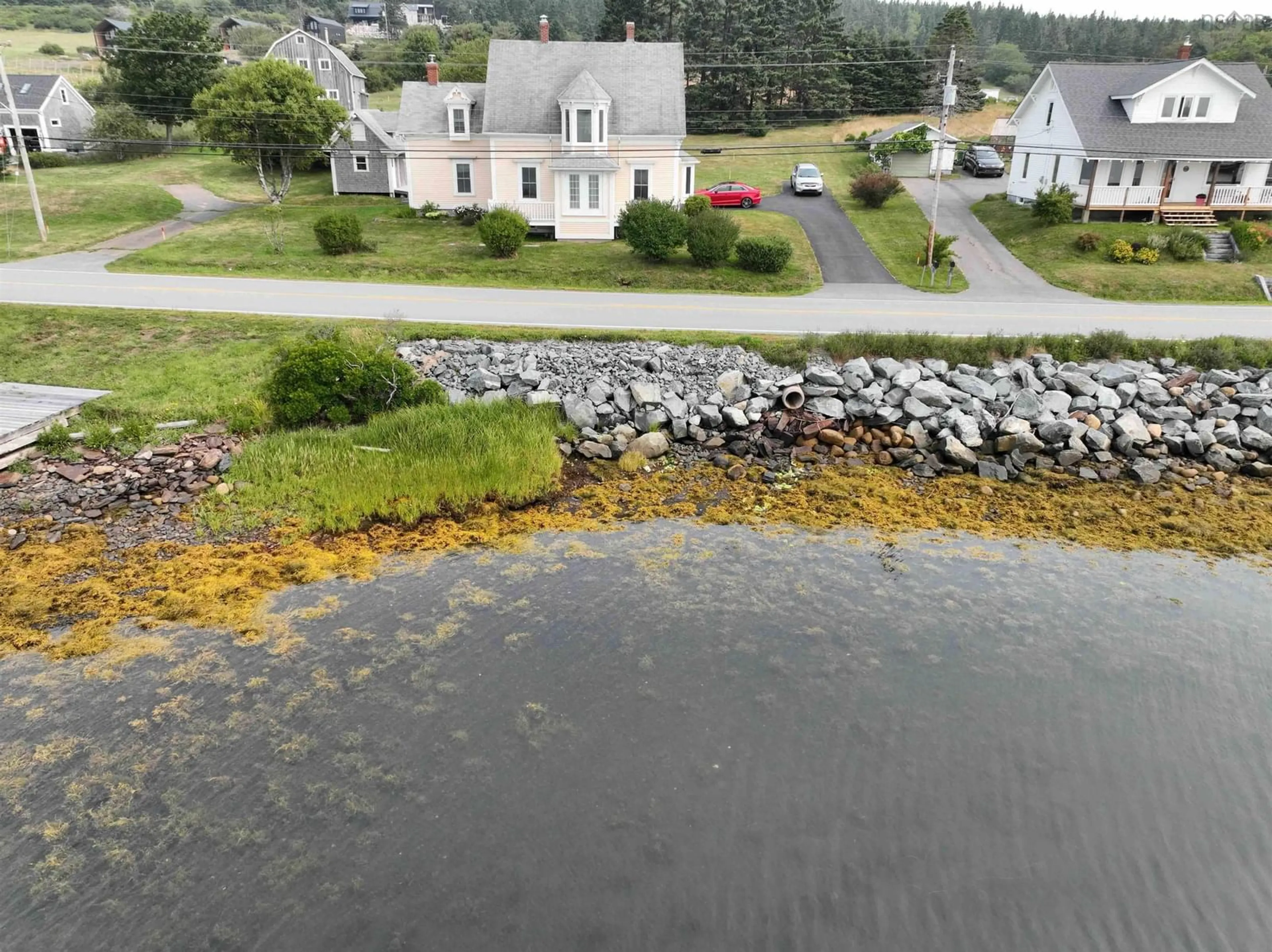 A pic from outside/outdoor area/front of a property/back of a property/a pic from drone, water/lake/river/ocean view for 3964 332 Hwy, Riverport Nova Scotia B0J 2X0