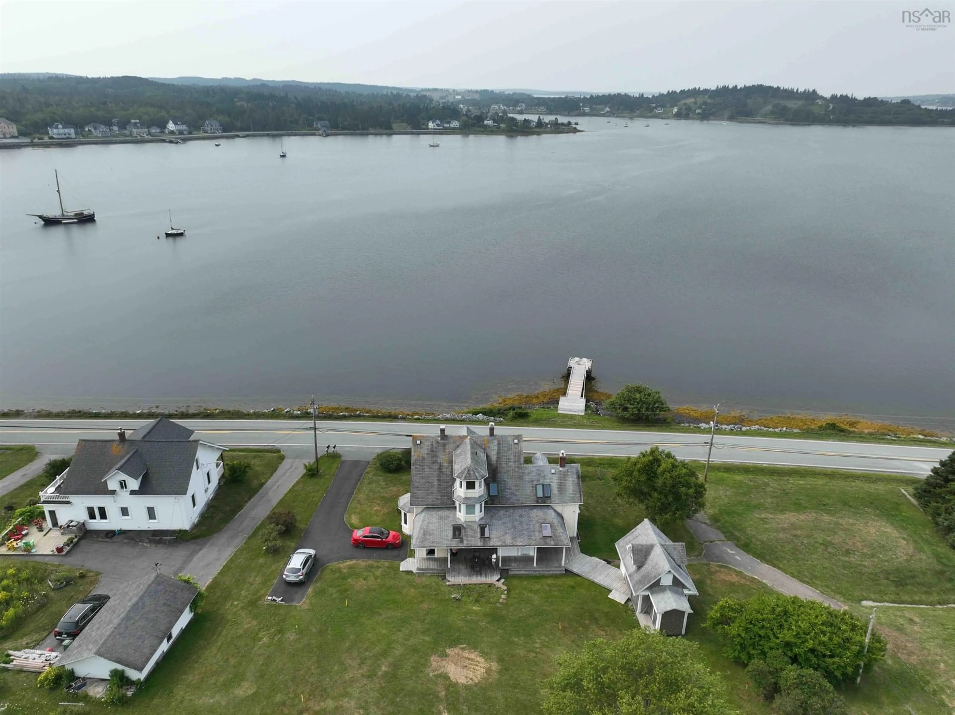 A pic from outside/outdoor area/front of a property/back of a property/a pic from drone, water/lake/river/ocean view for 3964 332 Hwy, Riverport Nova Scotia B0J 2X0