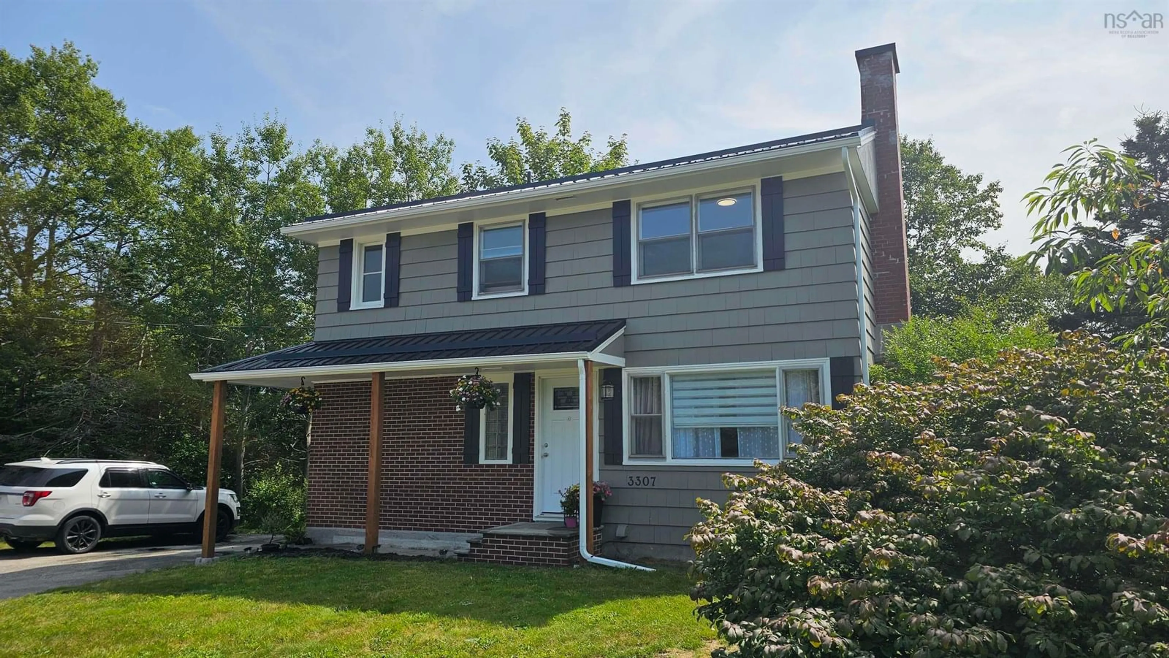 Home with vinyl exterior material, street for 3307 Highway 3, Barrington Passage Nova Scotia B0W 1G0