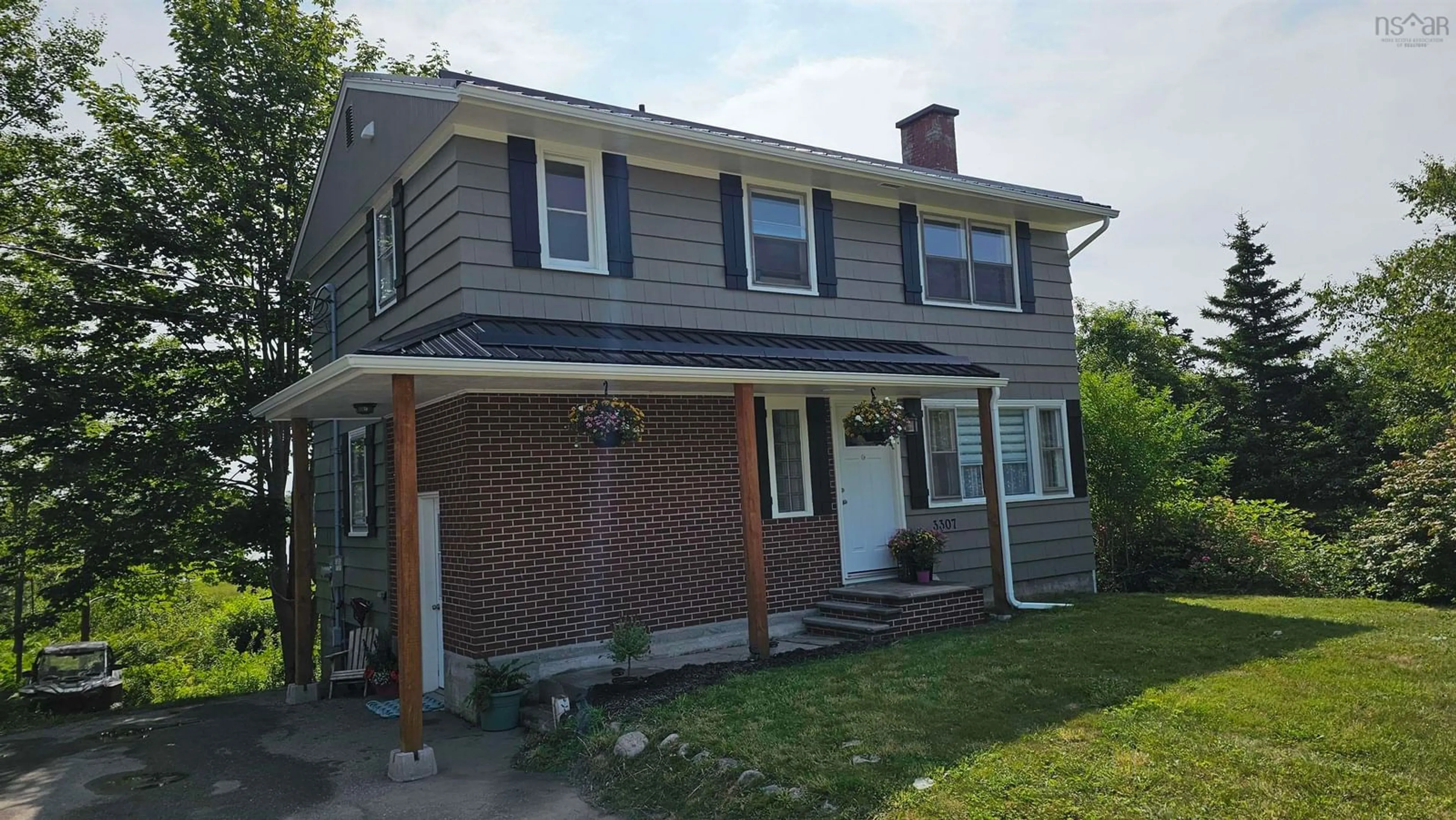 Home with vinyl exterior material, street for 3307 Highway 3, Barrington Passage Nova Scotia B0W 1G0