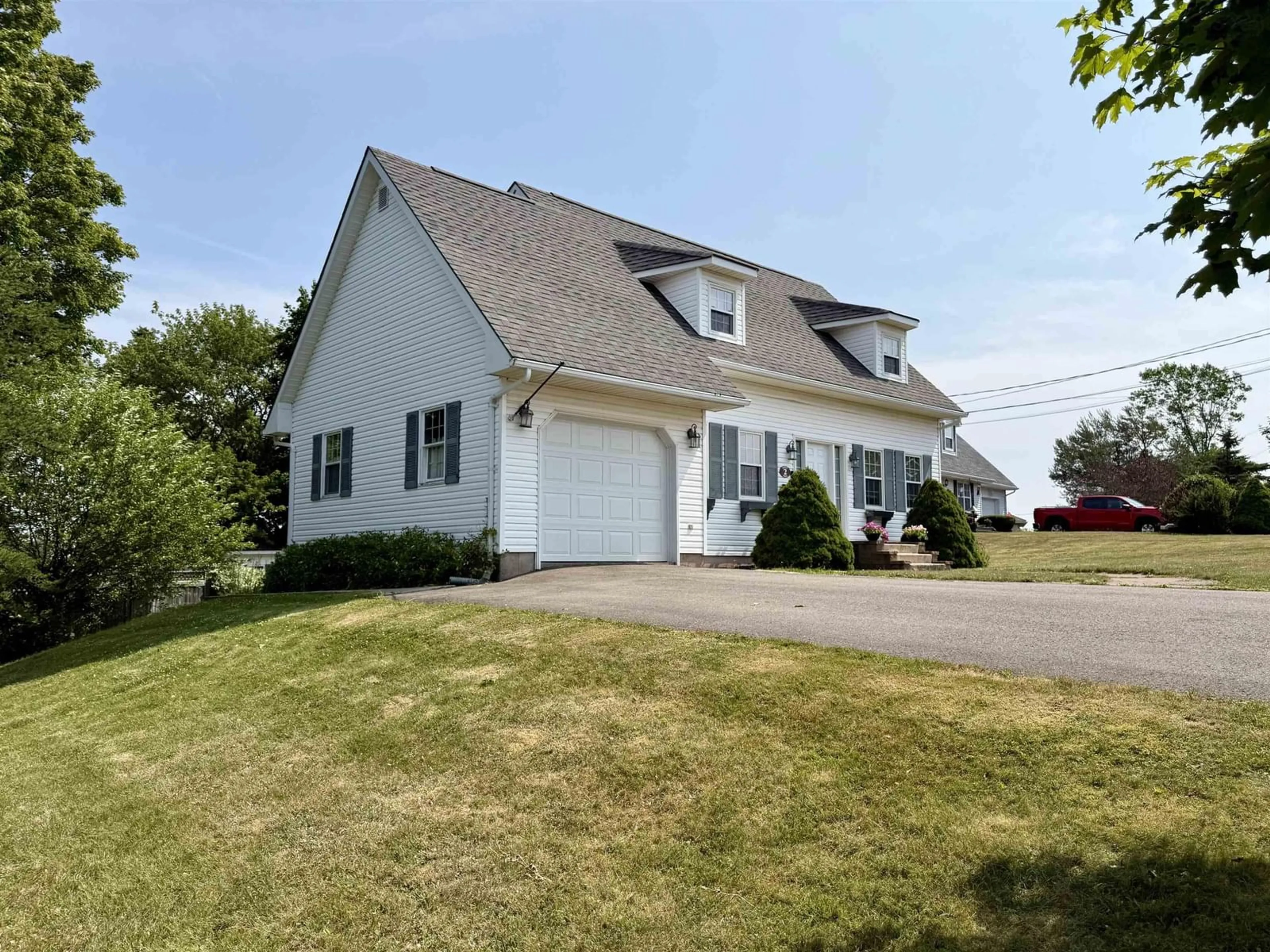 Home with vinyl exterior material, street for 2 Abbey Rd, Amherst Nova Scotia B4H 4T2