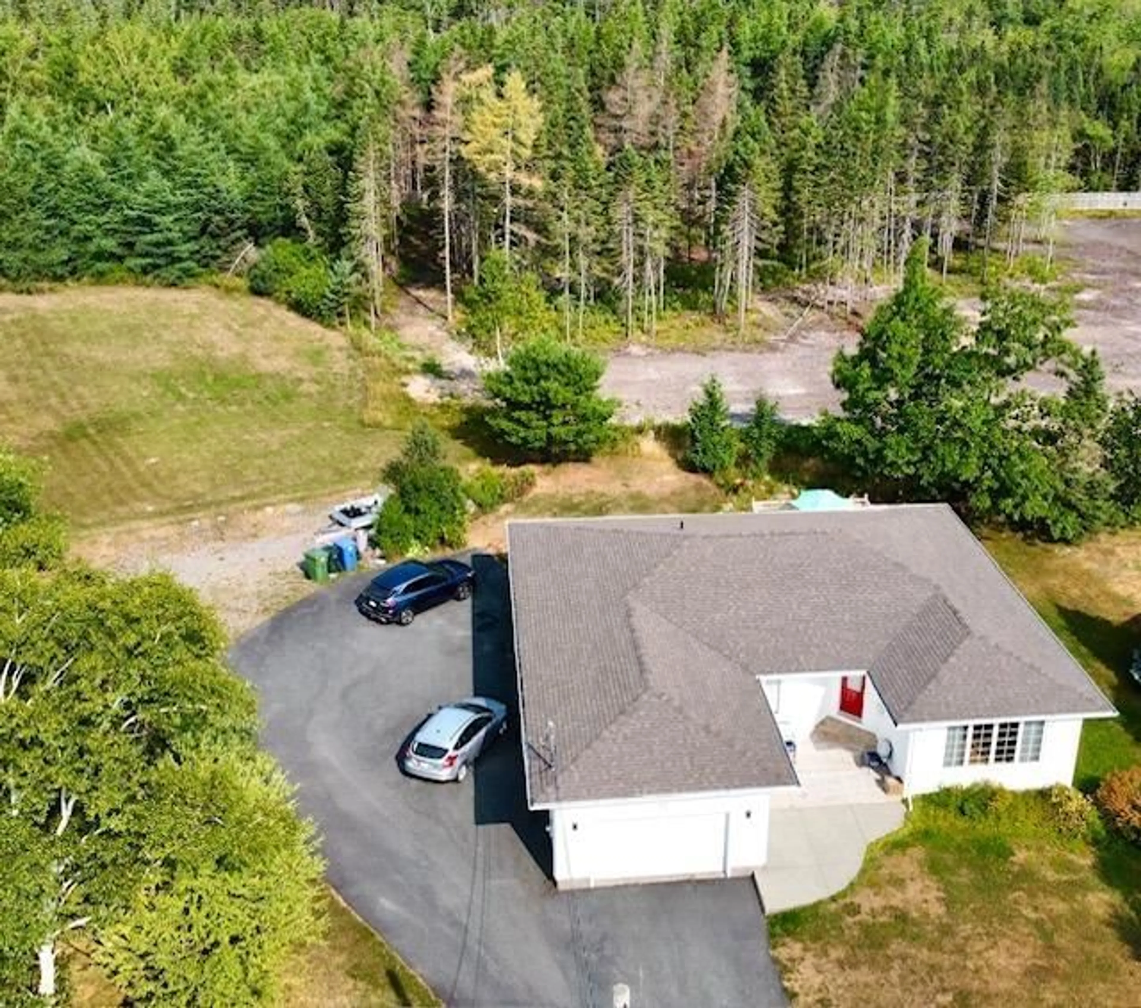 A pic from outside/outdoor area/front of a property/back of a property/a pic from drone, unknown for 52 Amberwood Cres, Westmount Nova Scotia B1P 2J8