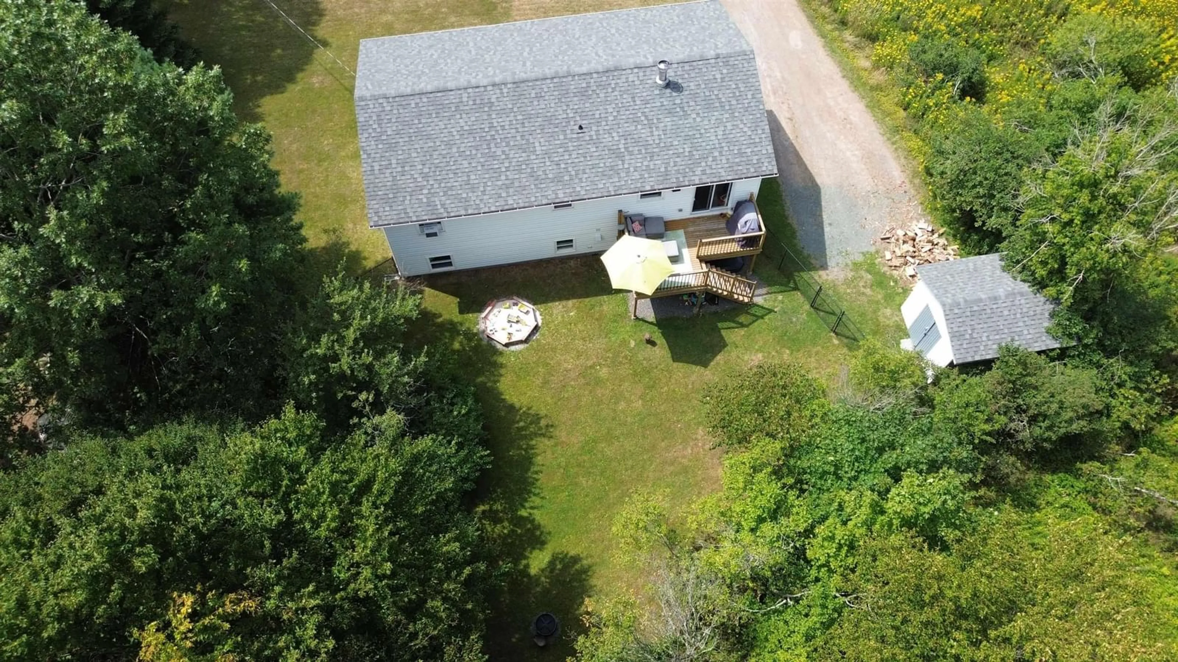A pic from outside/outdoor area/front of a property/back of a property/a pic from drone, building for 21 Ice Pond Dr, Salmon River Nova Scotia B2N 6P6
