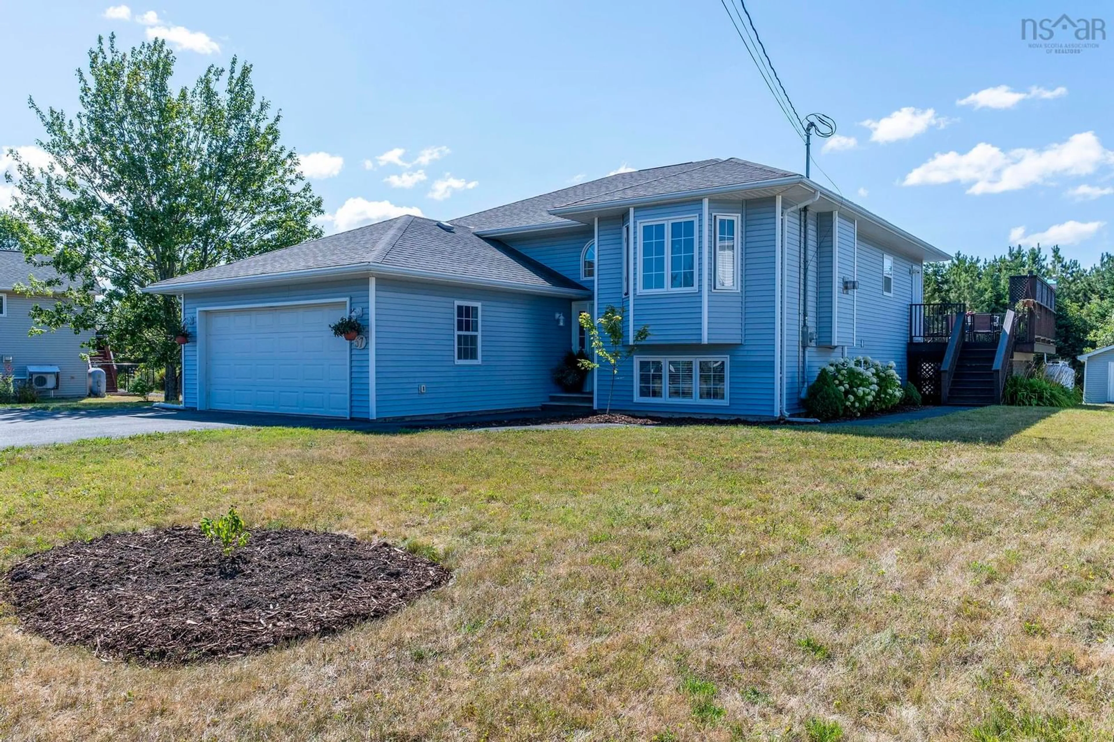 Home with vinyl exterior material, street for 57 Macmillan Dr, Enfield Nova Scotia B2S 1A5