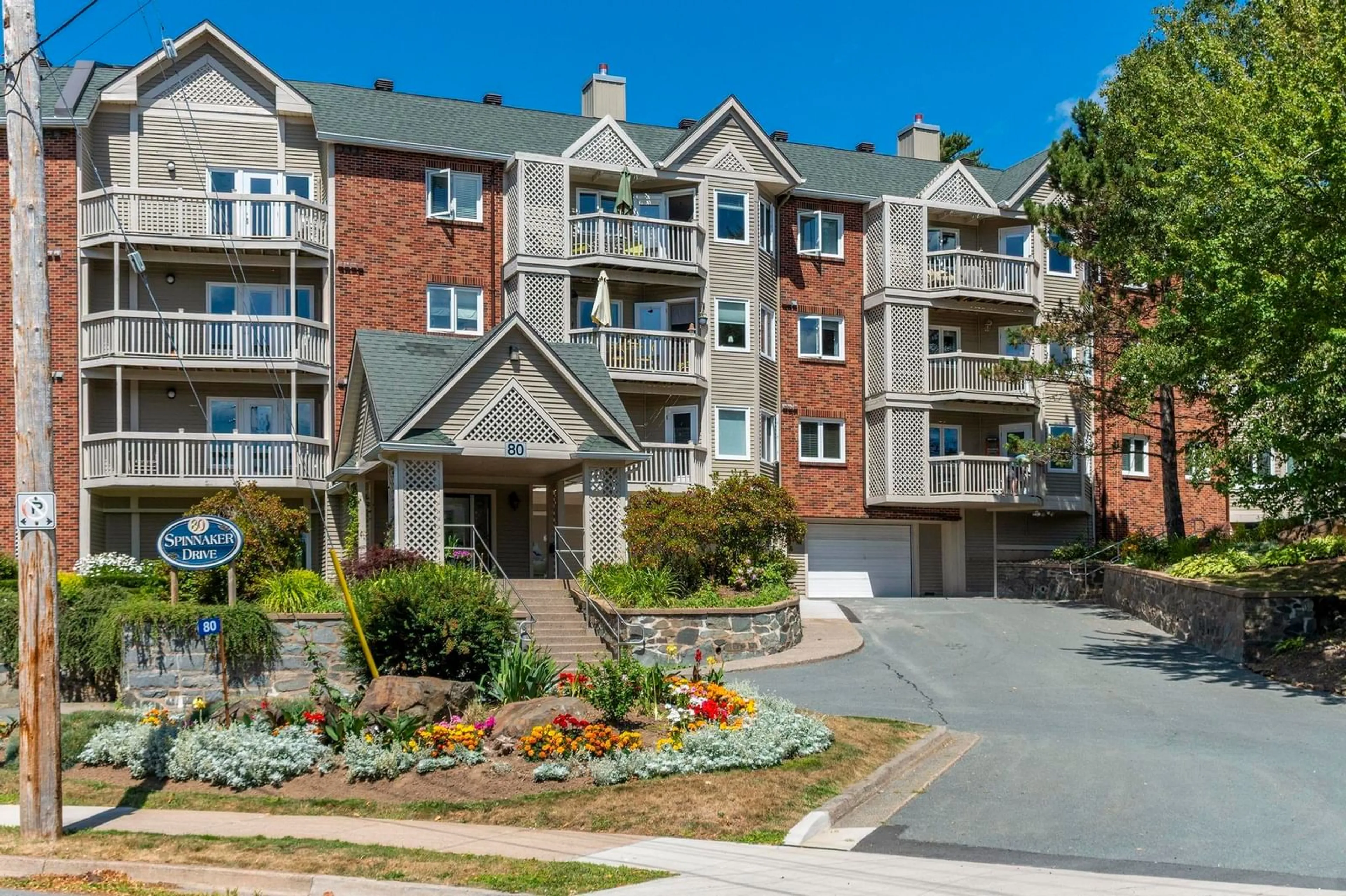 A pic from outside/outdoor area/front of a property/back of a property/a pic from drone, unknown for 80 Spinnaker Dr #301, Halifax Nova Scotia B3N 3B5