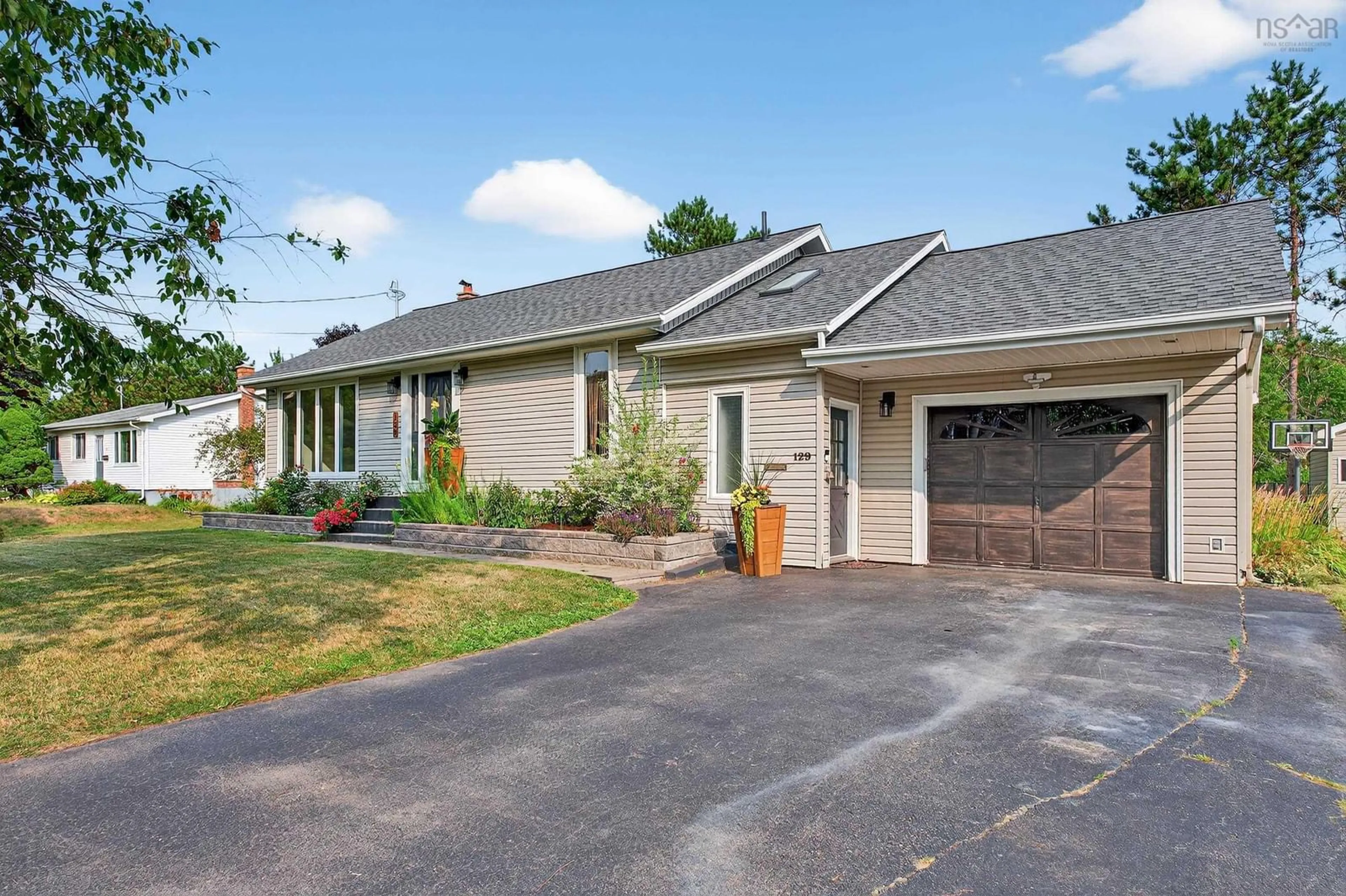 Home with brick exterior material, street for 129 Thompson Avenue, Sydney River Nova Scotia B1S 1L3
