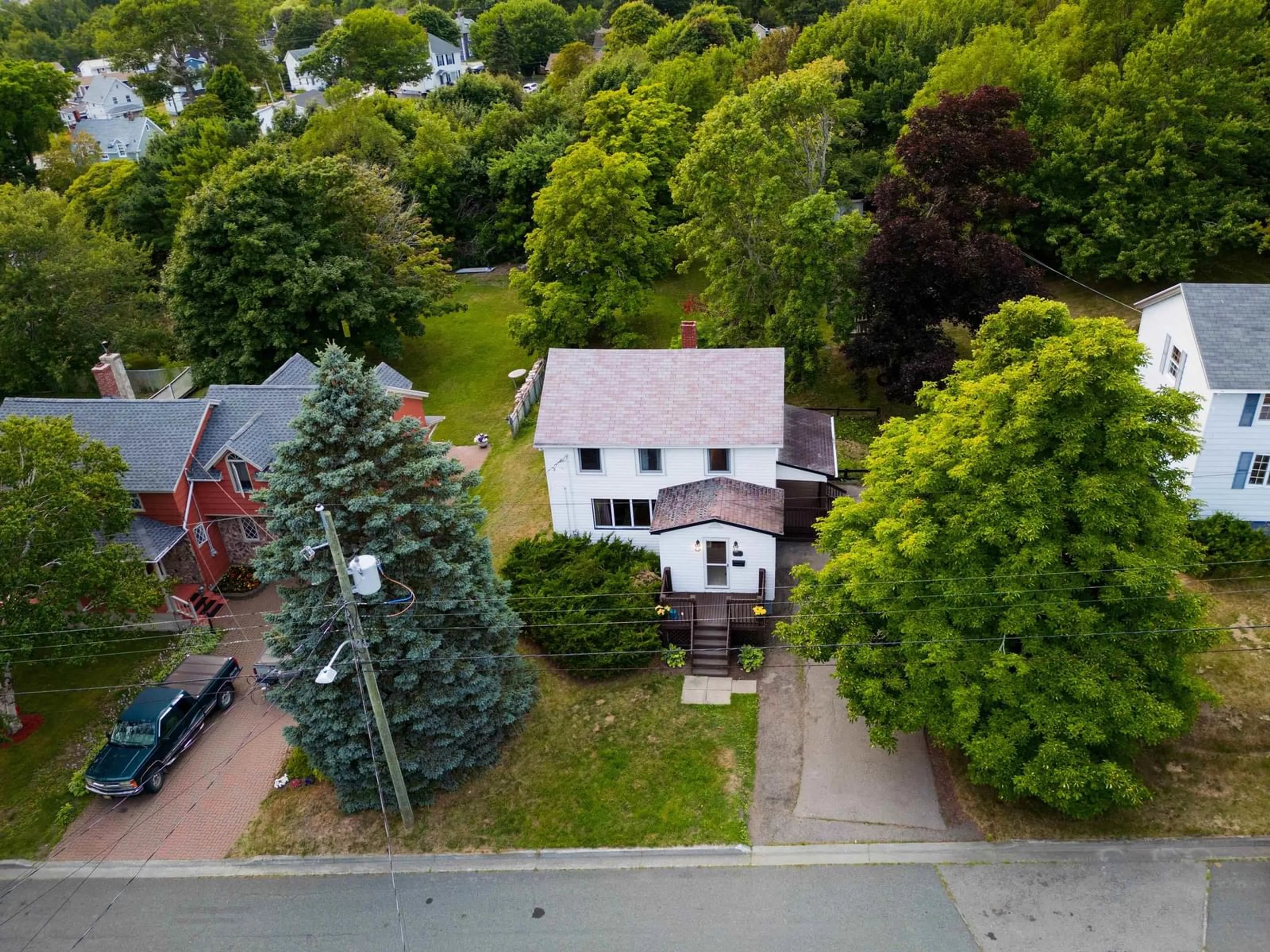 A pic from outside/outdoor area/front of a property/back of a property/a pic from drone, street for 13 View St, Sydney Mines Nova Scotia B1V 1G9