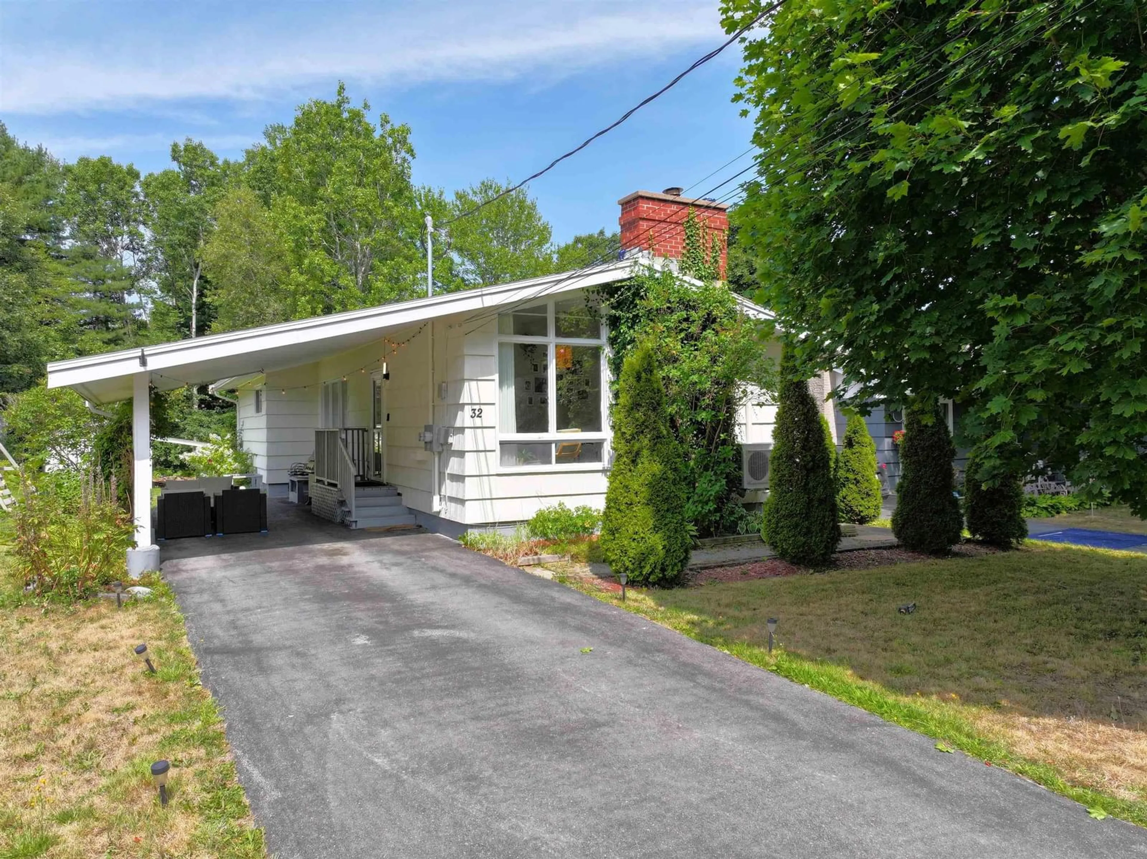Home with vinyl exterior material, street for 32 Murray Dr, Bridgewater Nova Scotia B4V 2M7