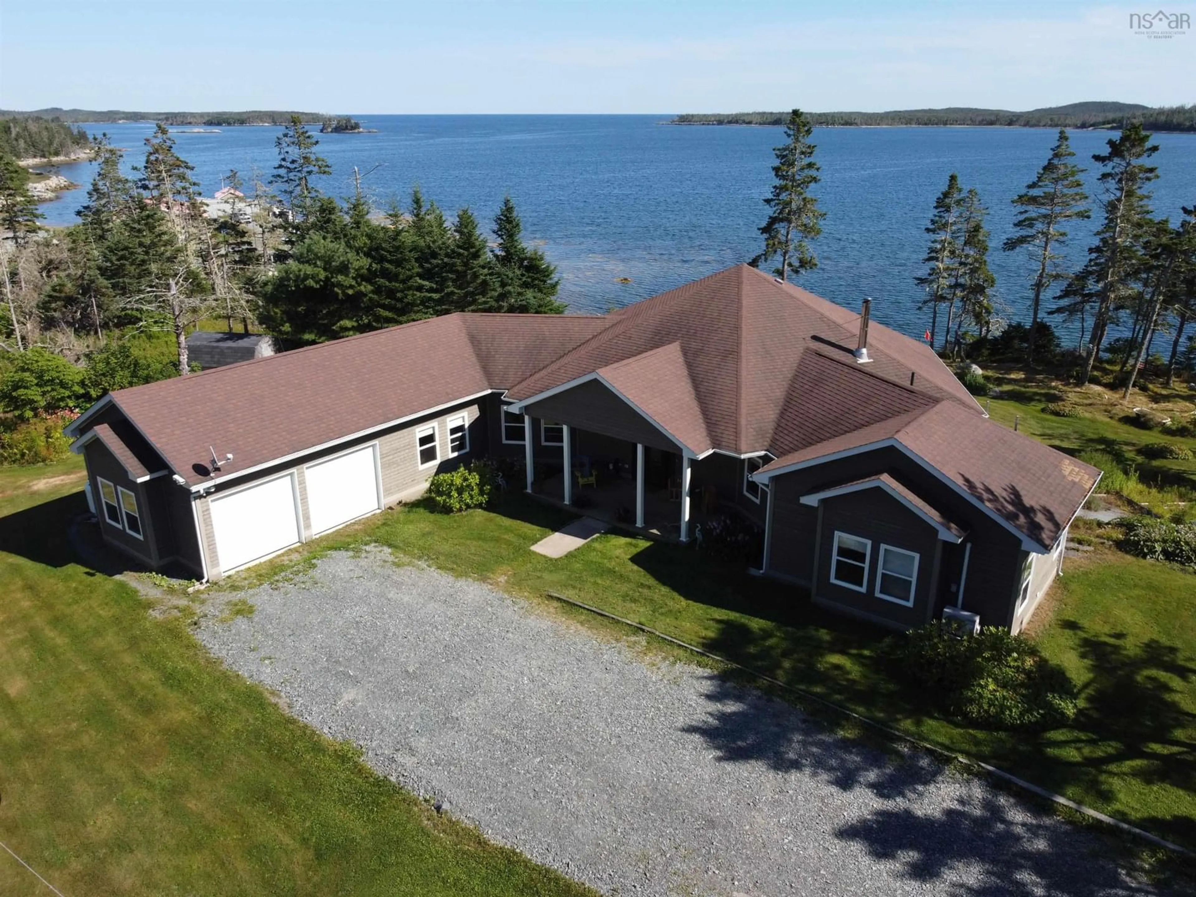 A pic from outside/outdoor area/front of a property/back of a property/a pic from drone, water/lake/river/ocean view for 30 & 32 Lofty Pine Rd, Popes Harbour Nova Scotia B0J 3H0