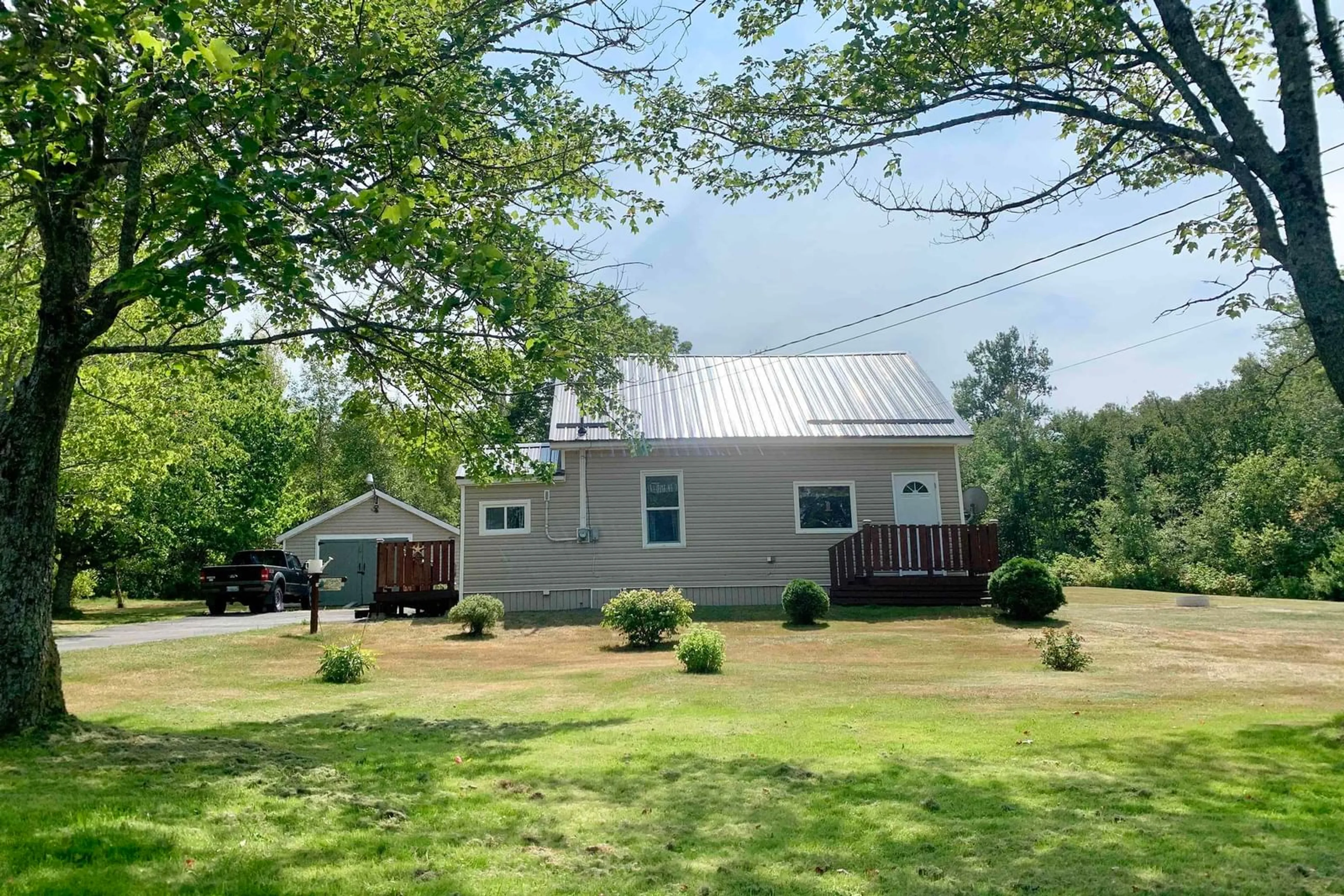A pic from outside/outdoor area/front of a property/back of a property/a pic from drone, water/lake/river/ocean view for 1334 Highway 321, Valley Road Nova Scotia B0M 1V0