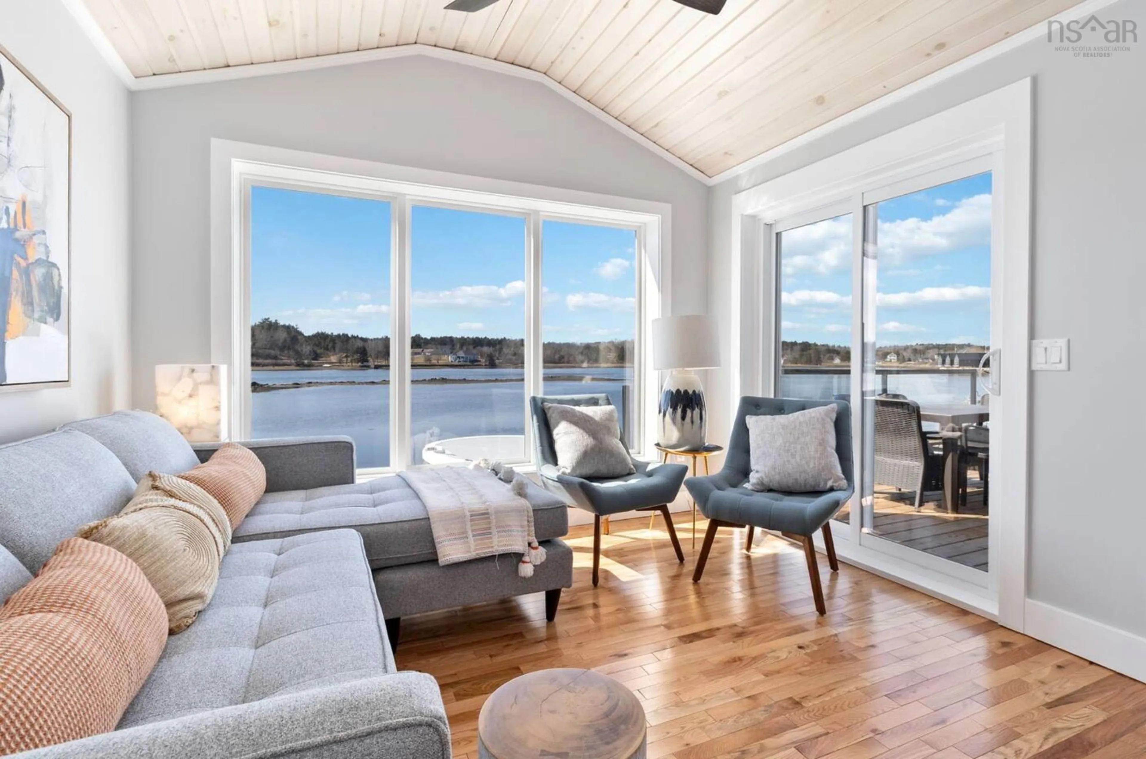 Living room with furniture, wood/laminate floor for 693 Masons Beach Rd #7, First South Nova Scotia B0J 2C0