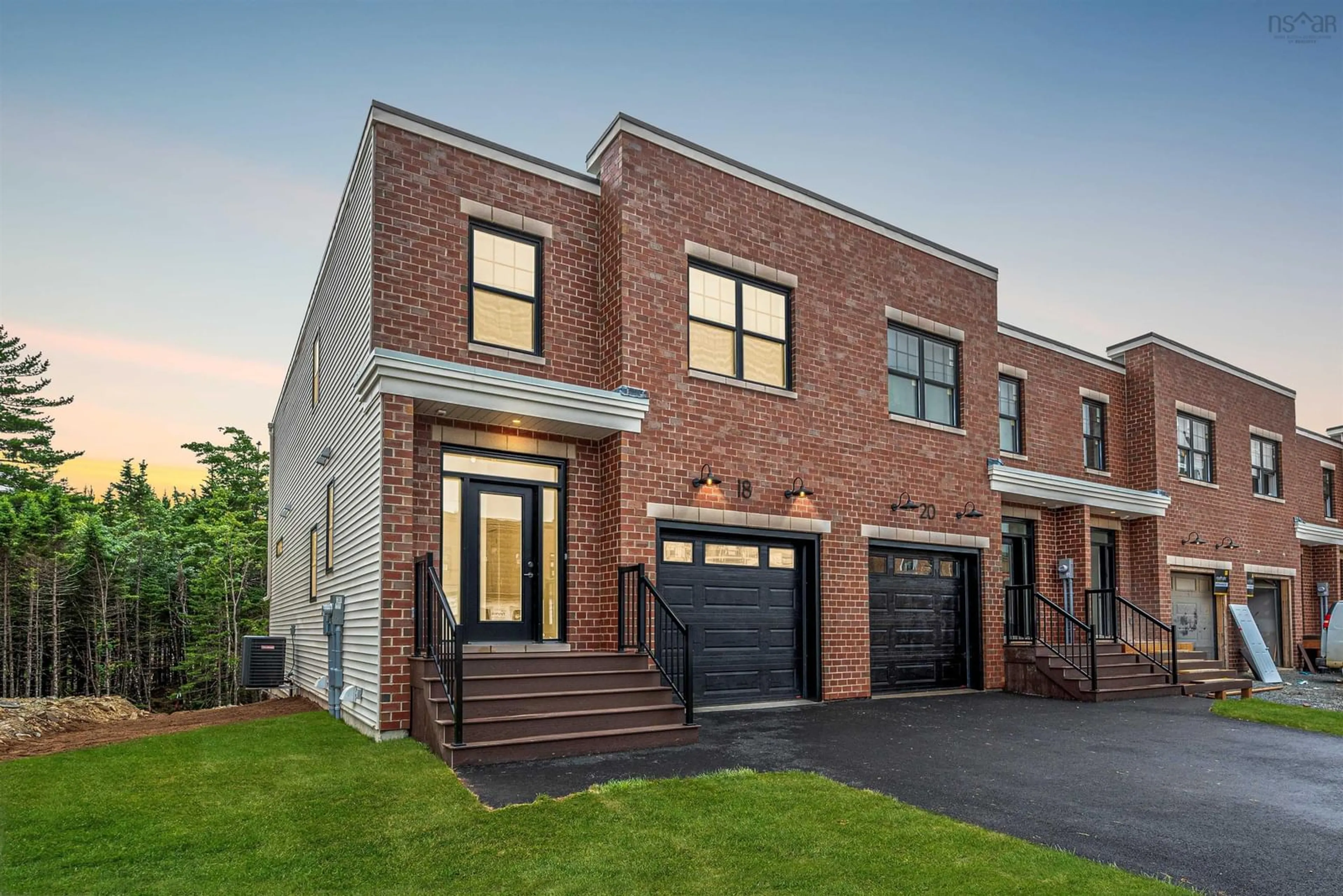Home with brick exterior material, street for 18 Trekker Dr, Bedford Nova Scotia B4B 2K7