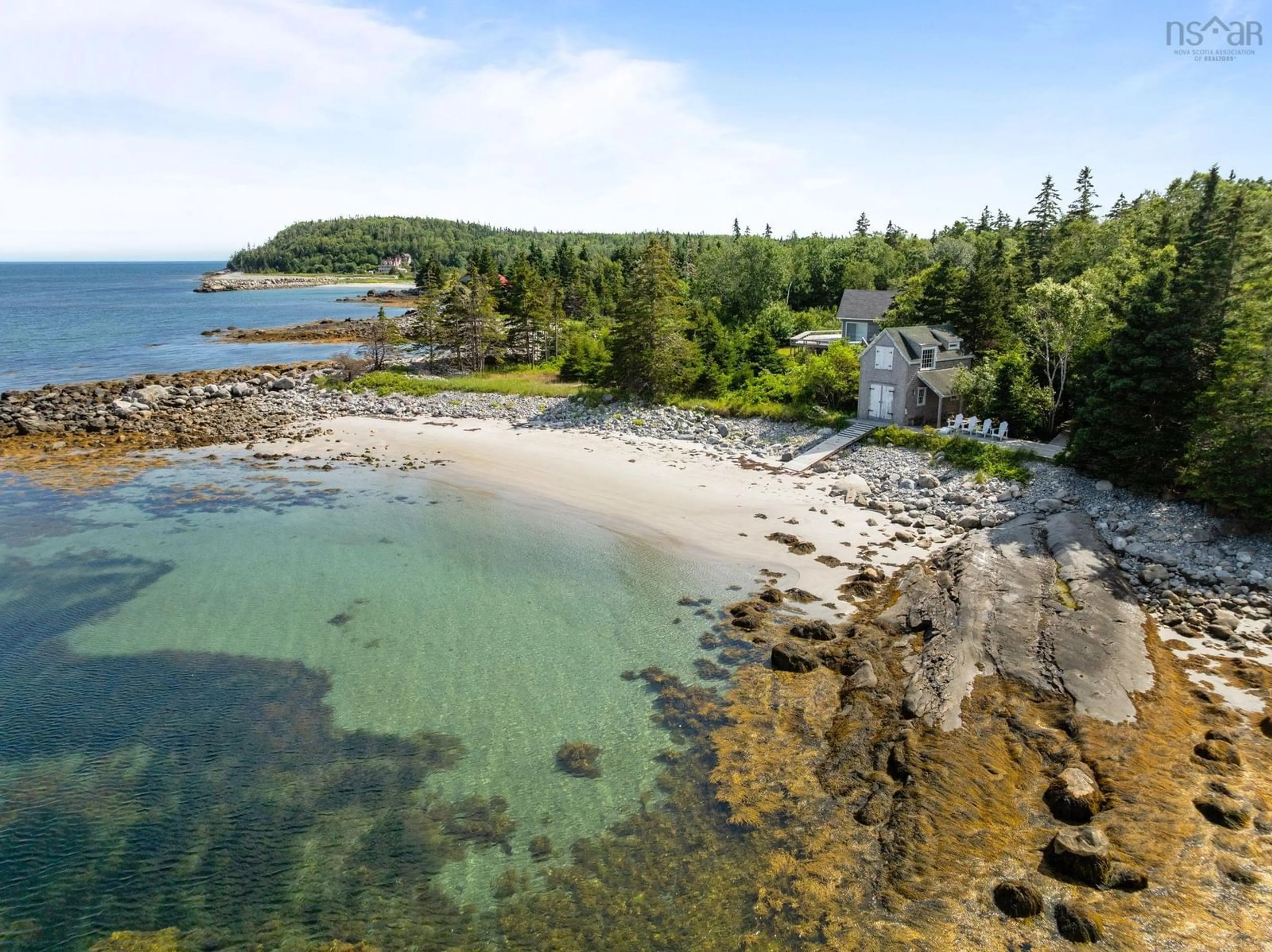 A pic from outside/outdoor area/front of a property/back of a property/a pic from drone, water/lake/river/ocean view for 60 River Rd, Port L'Hebert Nova Scotia B0T 1V0