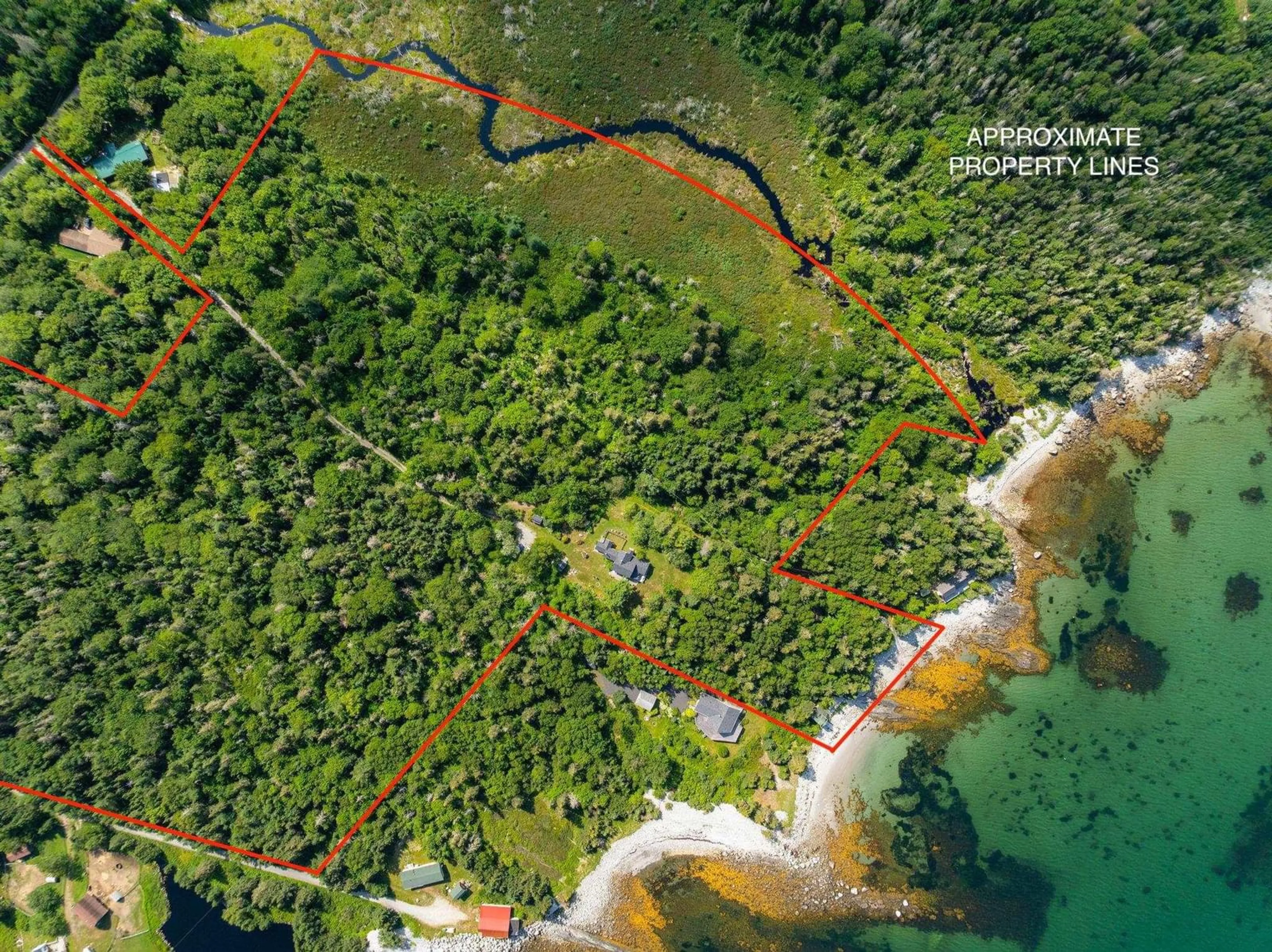 A pic from outside/outdoor area/front of a property/back of a property/a pic from drone, water/lake/river/ocean view for 60 River Rd, Port L'Hebert Nova Scotia B0T 1V0