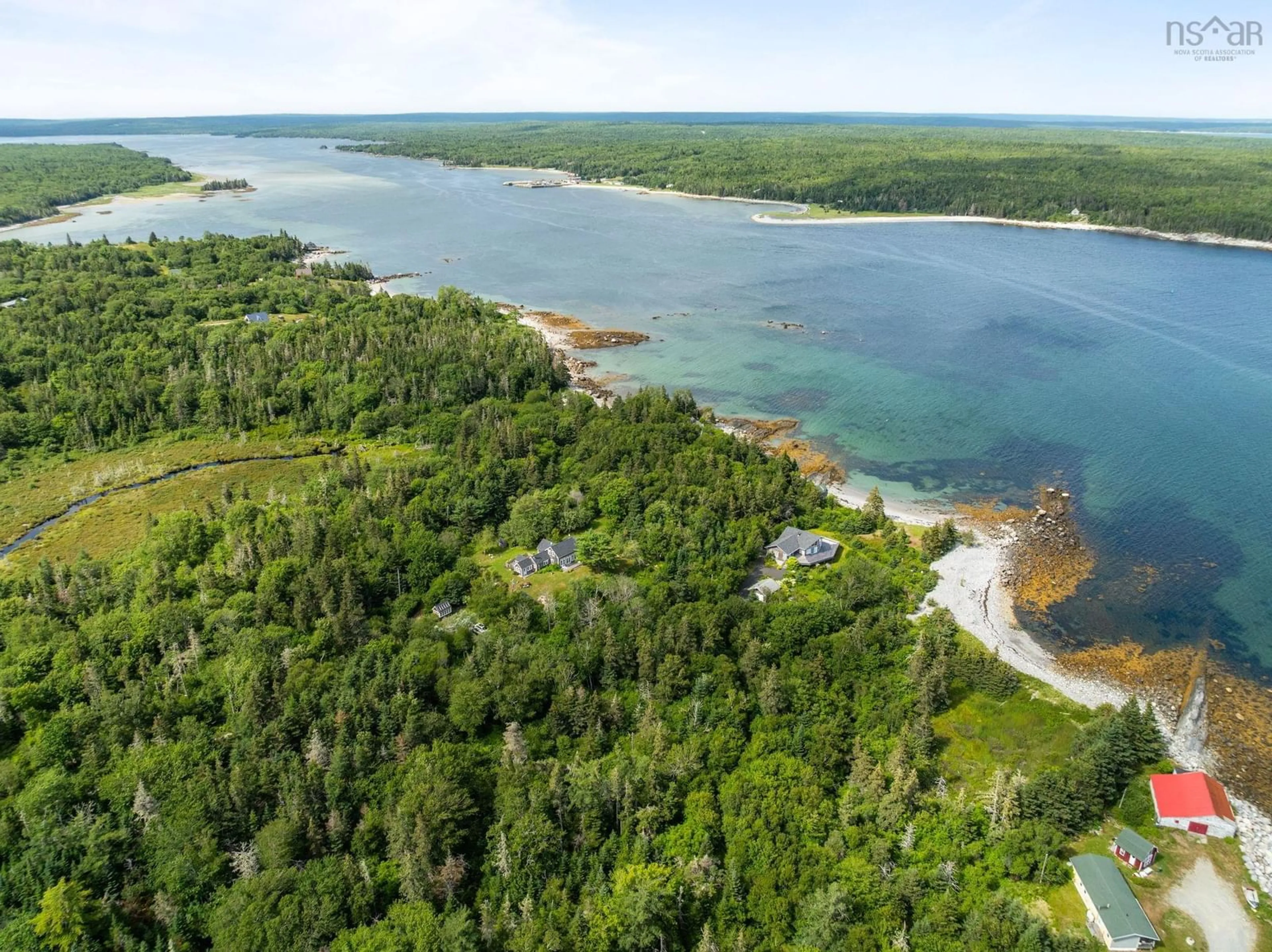 A pic from outside/outdoor area/front of a property/back of a property/a pic from drone, water/lake/river/ocean view for 60 River Rd, Port L'Hebert Nova Scotia B0T 1V0