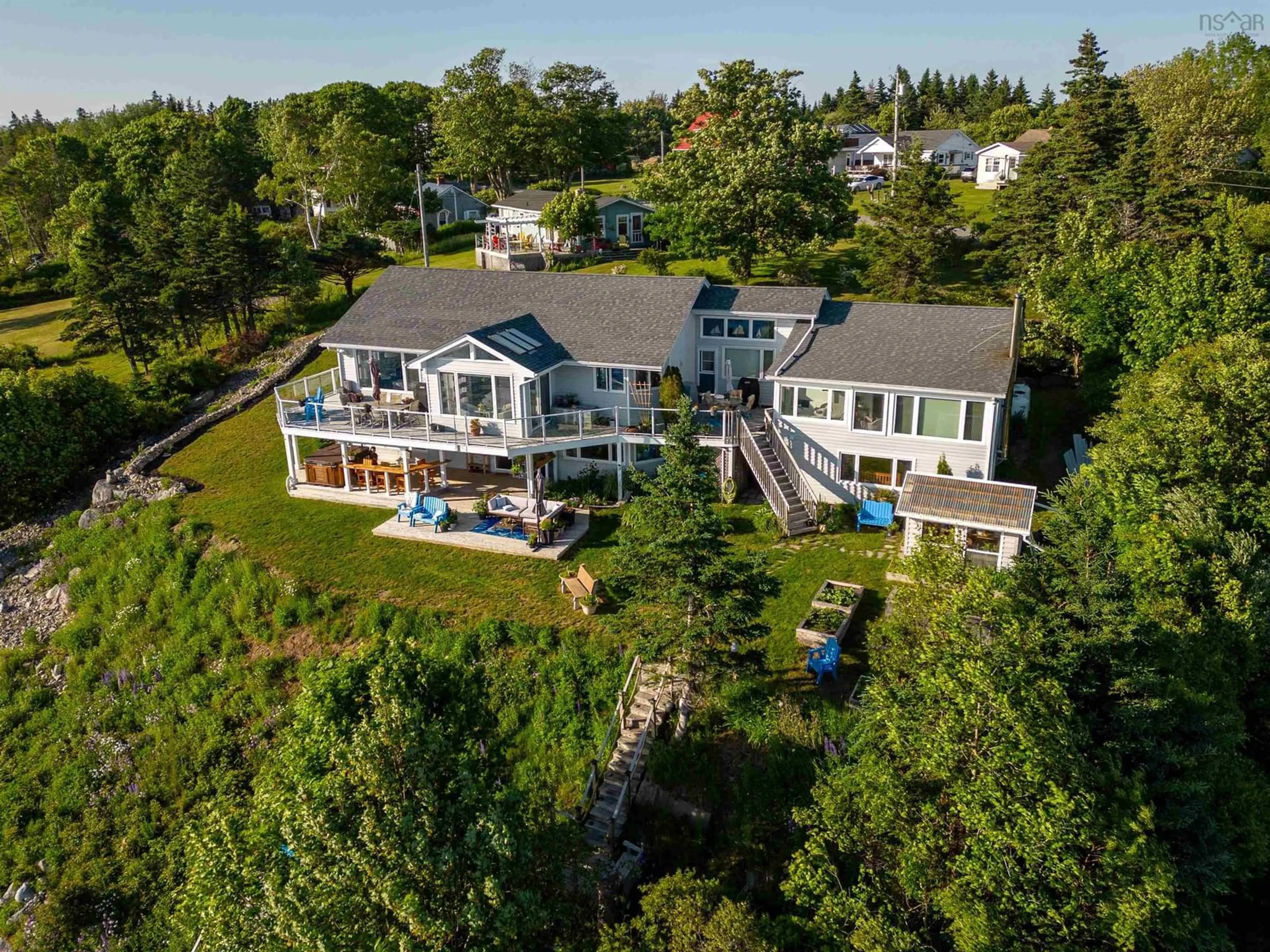 A pic from outside/outdoor area/front of a property/back of a property/a pic from drone, water/lake/river/ocean view for 54 Bayview Dr, Hackett's Cove Nova Scotia B3Z 3J9