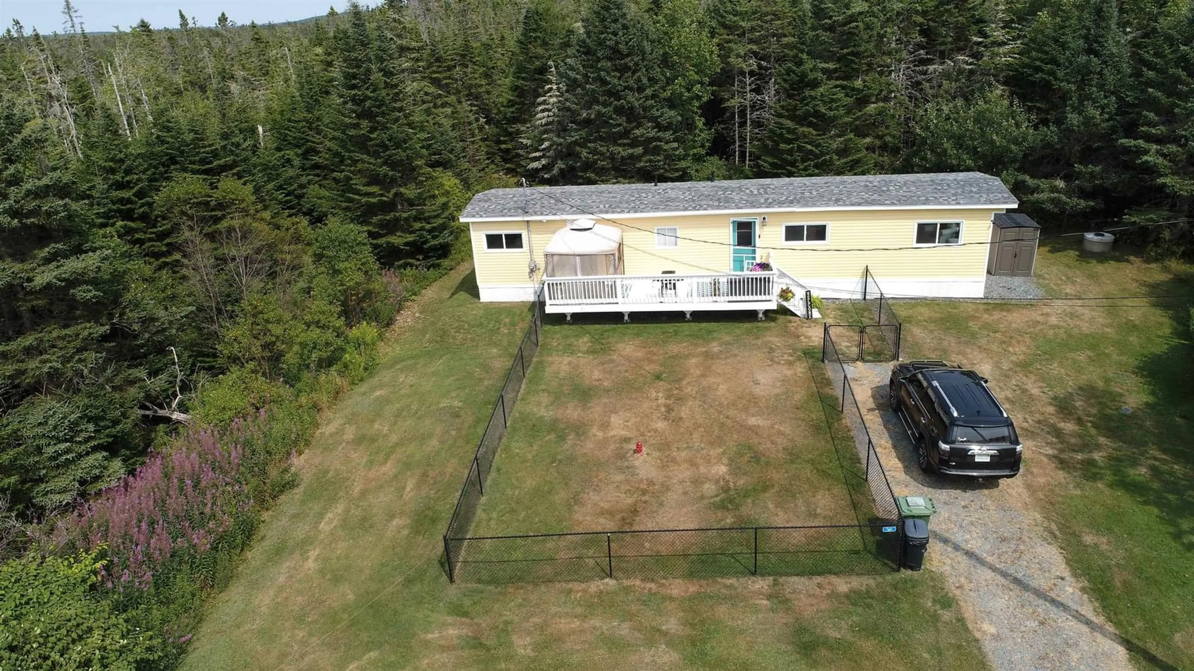 A pic from outside/outdoor area/front of a property/back of a property/a pic from drone, building for 825 East Jeddore Rd, East Jeddore Nova Scotia B0J 2L0