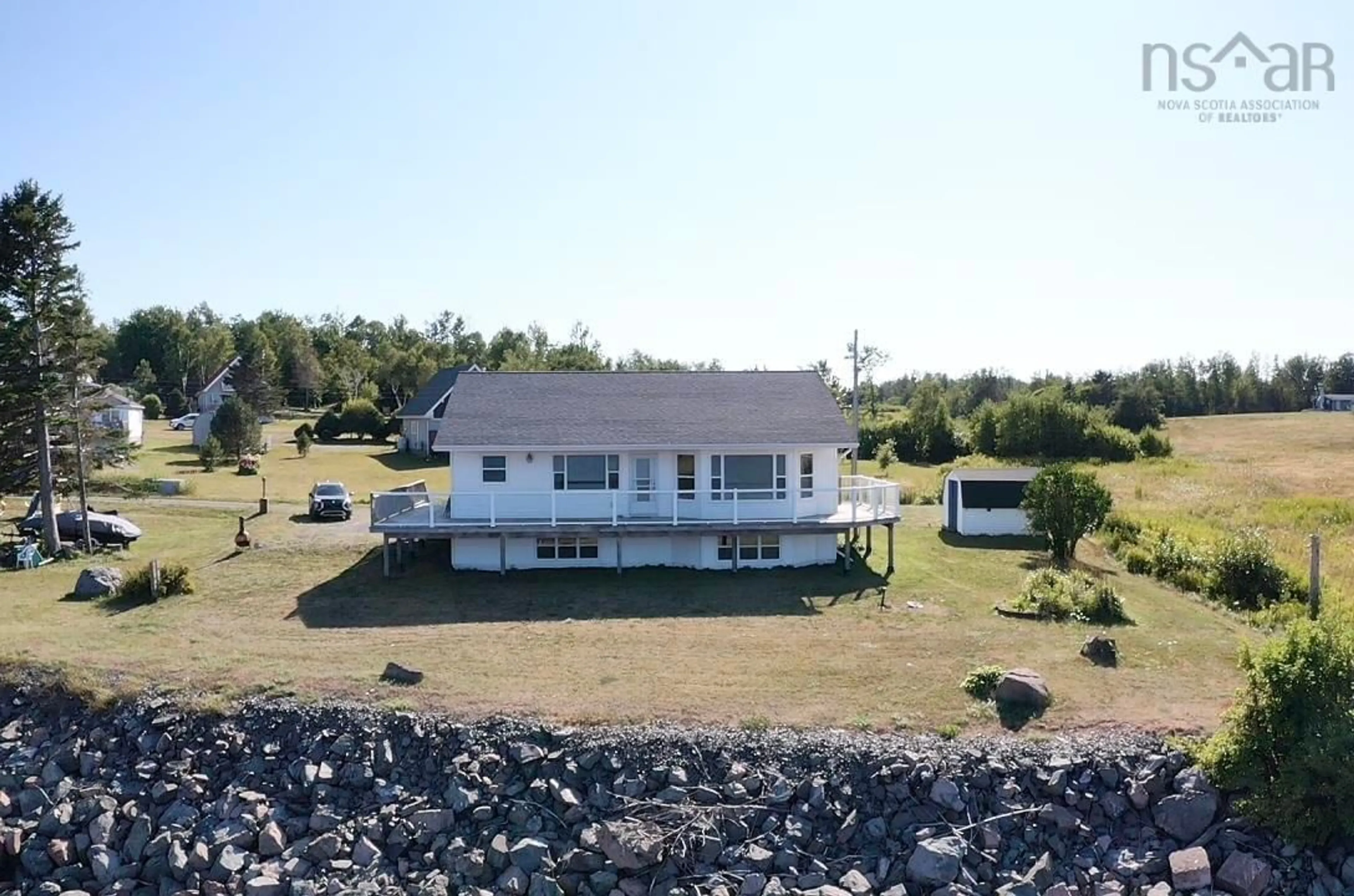 A pic from outside/outdoor area/front of a property/back of a property/a pic from drone, water/lake/river/ocean view for 13 Sunrise Blvd, Pugwash Nova Scotia B0K 1L0