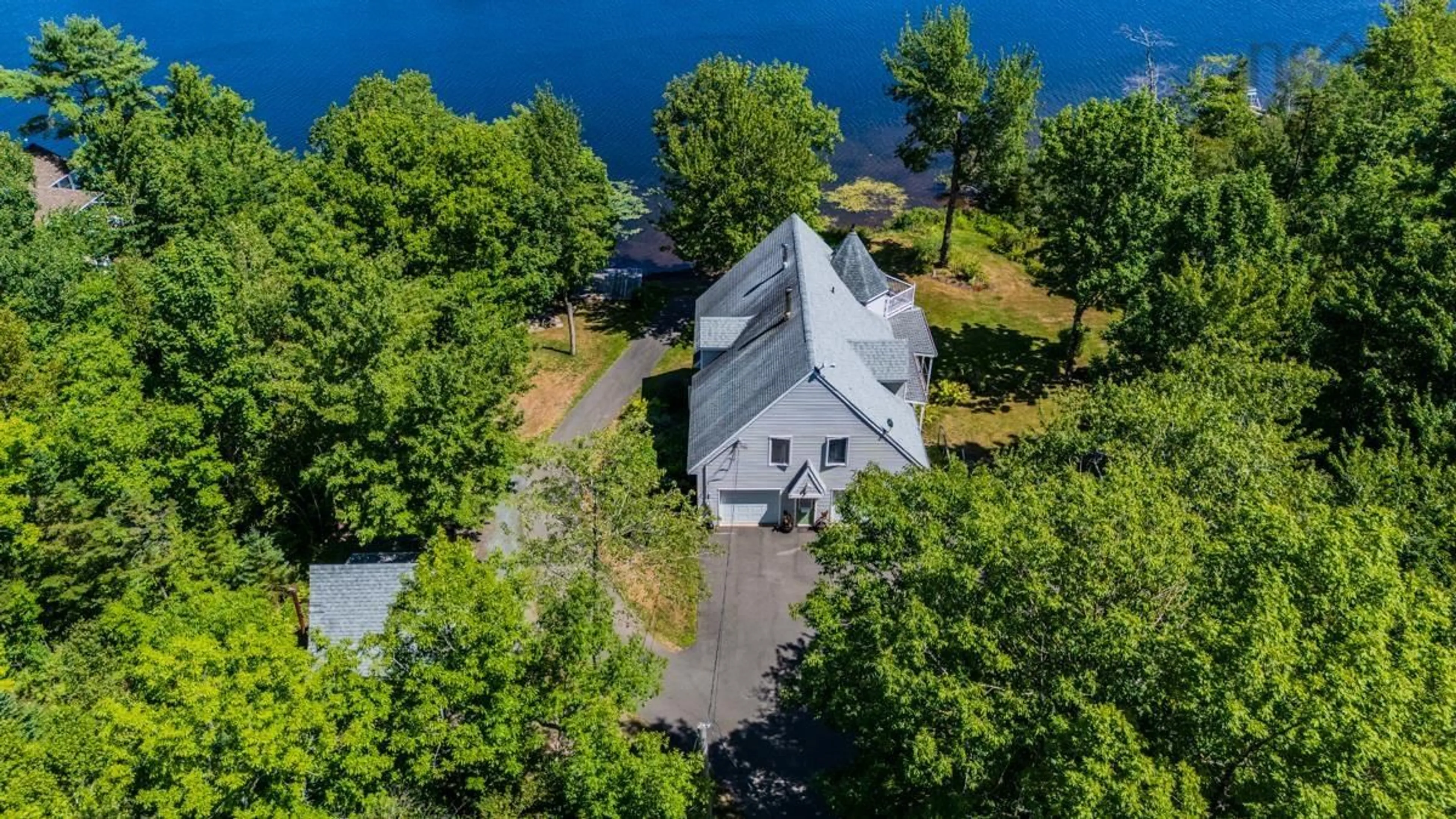 A pic from outside/outdoor area/front of a property/back of a property/a pic from drone, water/lake/river/ocean view for 209 Shortts Lake West Rd, Shortts Lake Nova Scotia B0N 1C0