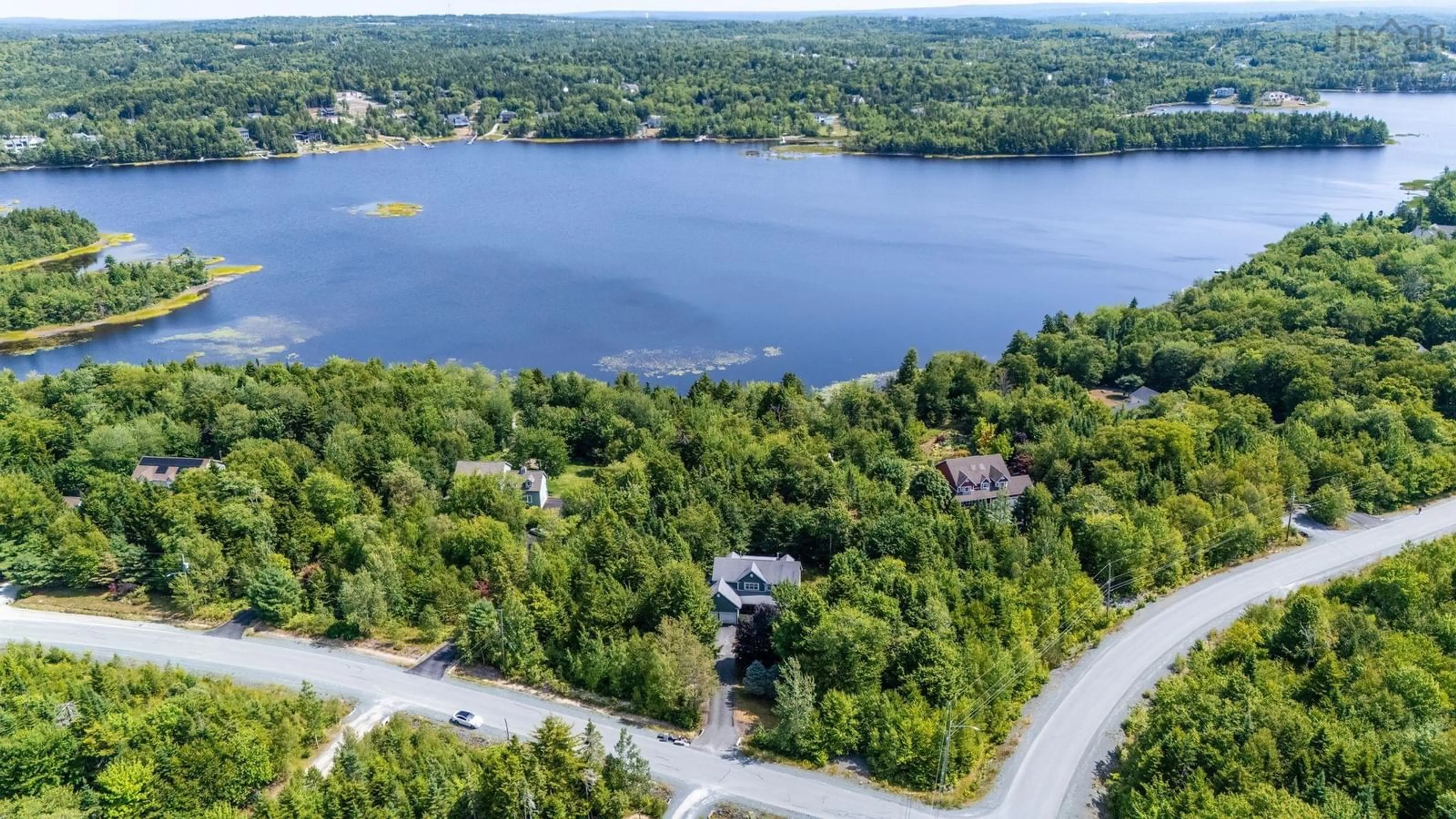 A pic from outside/outdoor area/front of a property/back of a property/a pic from drone, water/lake/river/ocean view for 510 Gleneagles Dr, Hammonds Plains Nova Scotia B4B 1V9