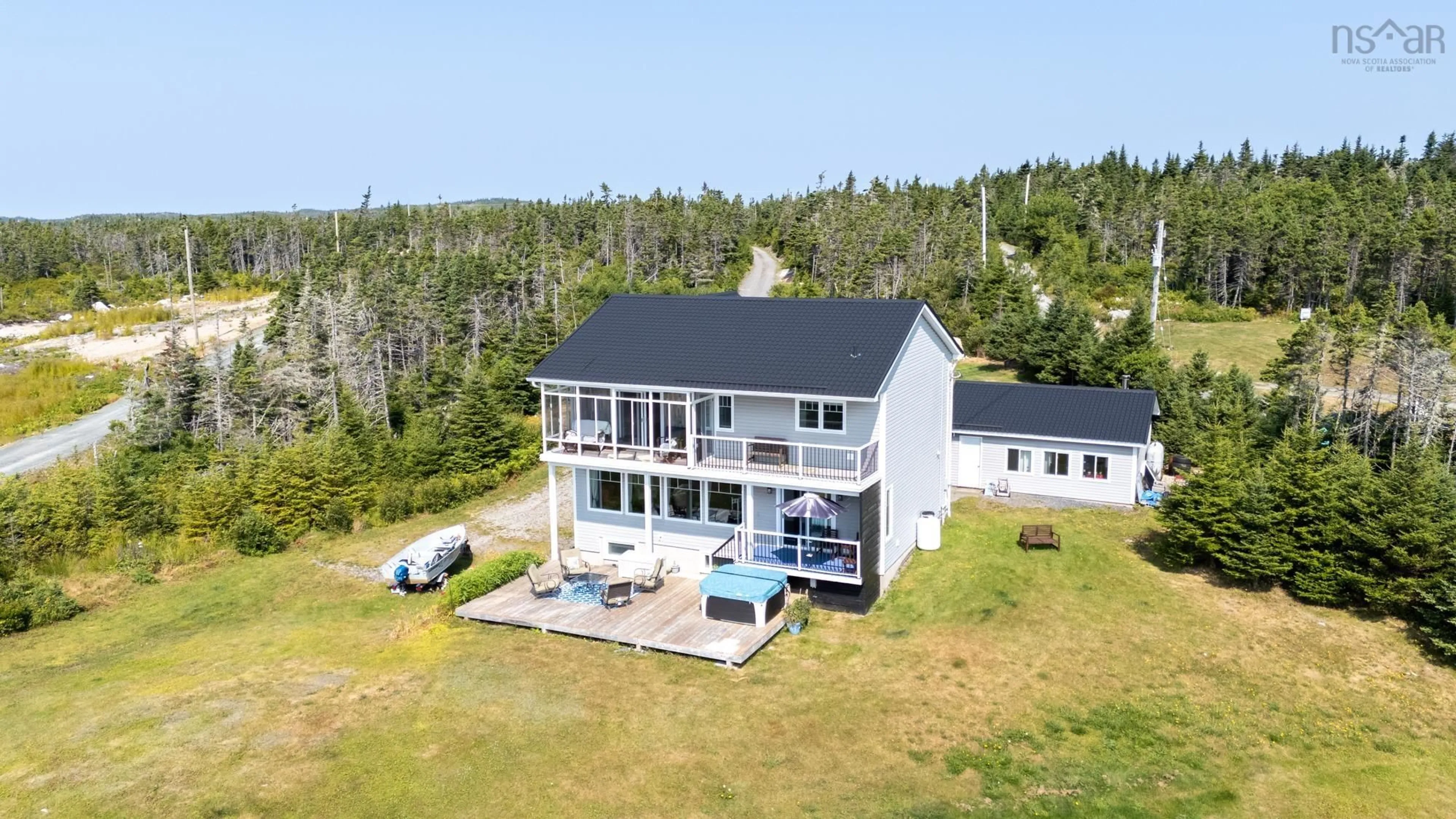 A pic from outside/outdoor area/front of a property/back of a property/a pic from drone, water/lake/river/ocean view for 102 Oceantide Lane, West Pennant Nova Scotia B3V 0E9
