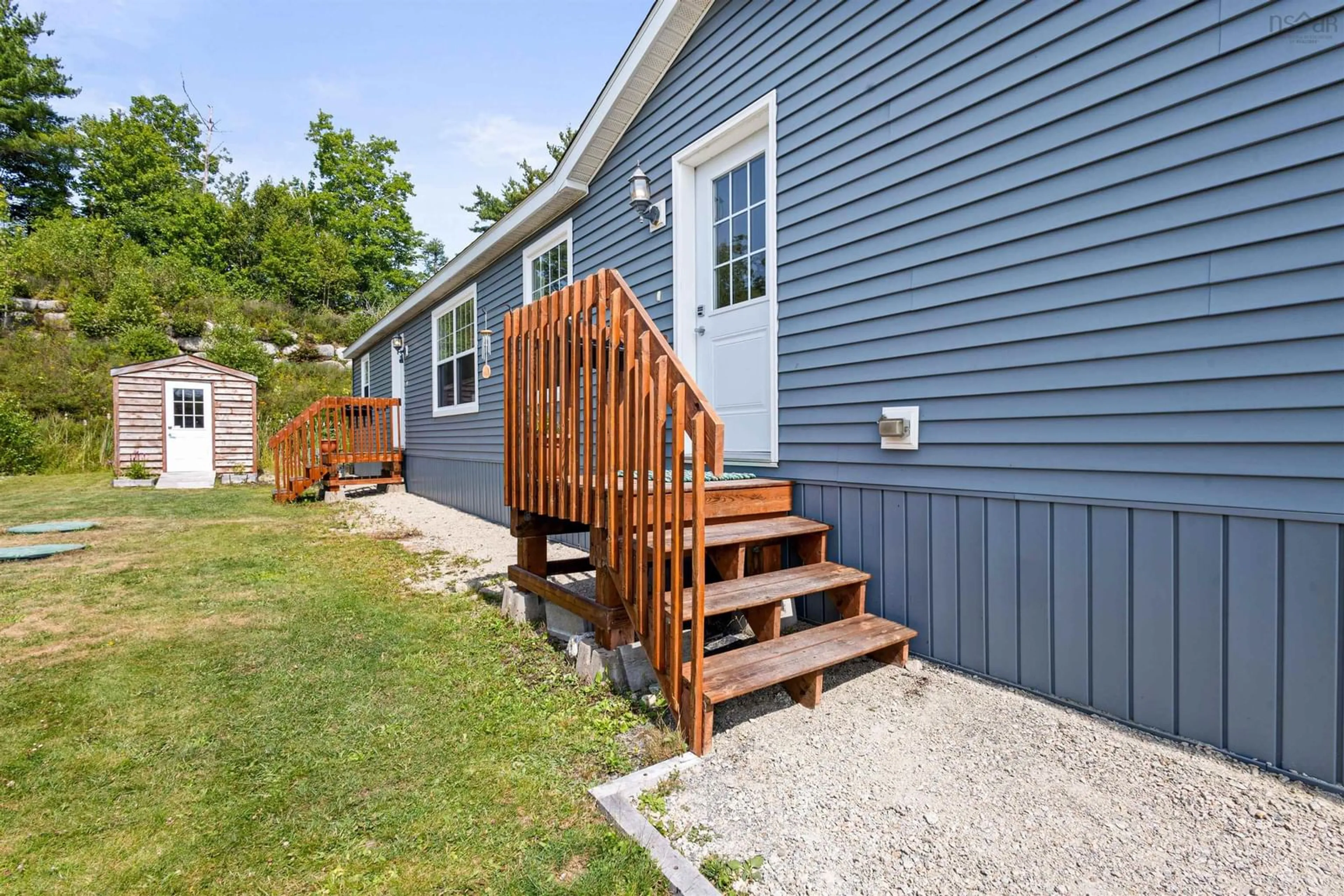 Home with vinyl exterior material, street for 13 Breeze Cir, Simms Settlement Nova Scotia B0J 1T0