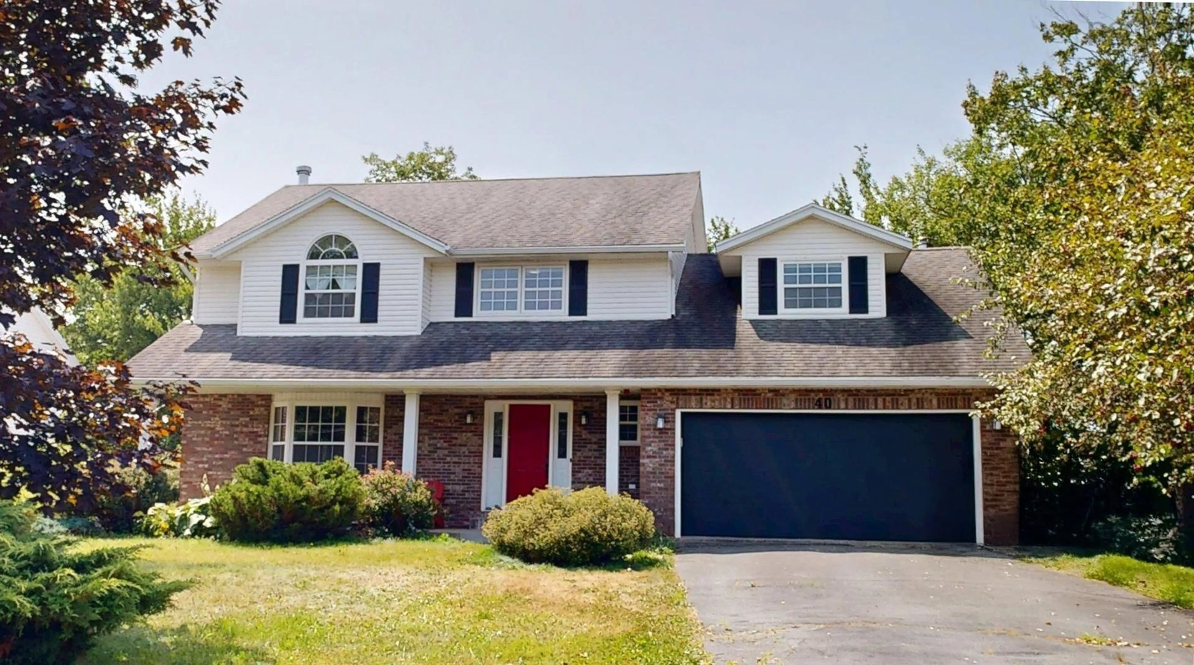 Home with vinyl exterior material, street for 40 Saratoga Drive, Dartmouth Nova Scotia B2X 3P9
