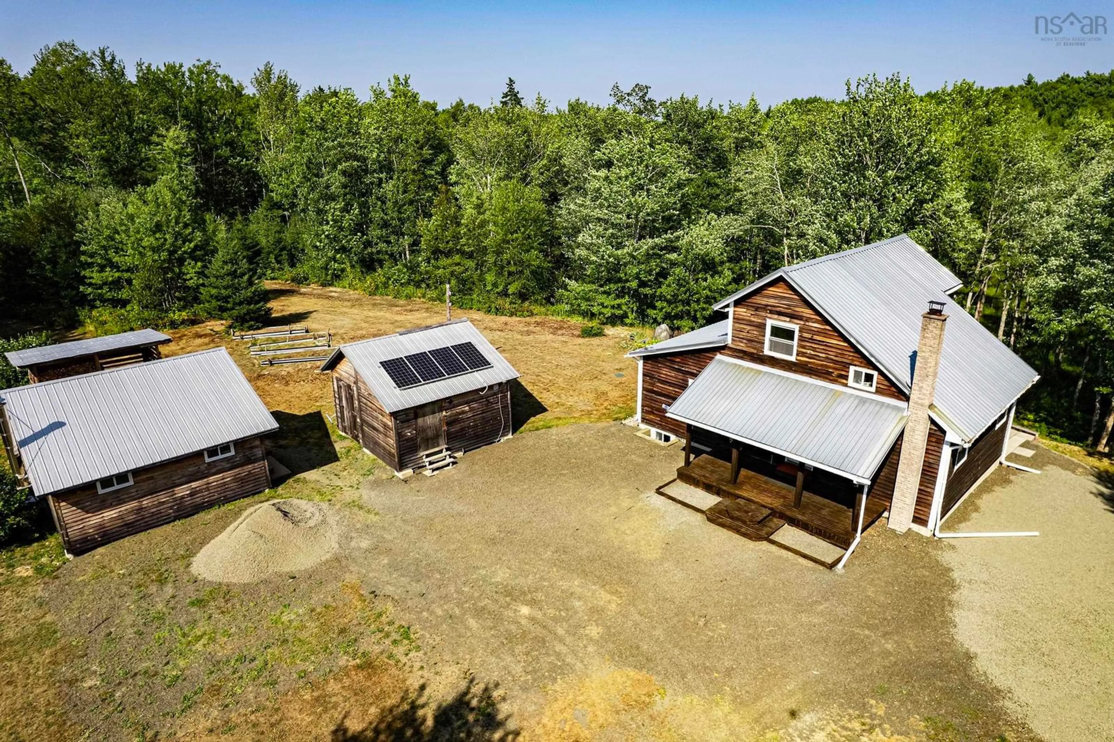 A pic from outside/outdoor area/front of a property/back of a property/a pic from drone, unknown for 5052 Clementsvale Rd, Princedale Nova Scotia B0S 1G0