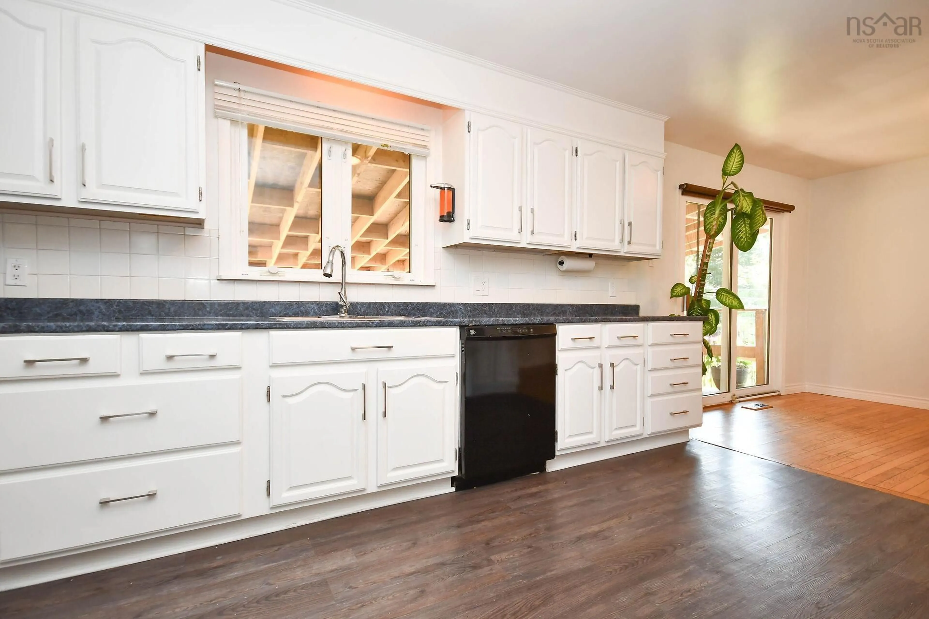 Open concept kitchen, wood/laminate floor for 16 Raymoor Dr, Dartmouth, Woodlawn Nova Scotia B2X 1G7