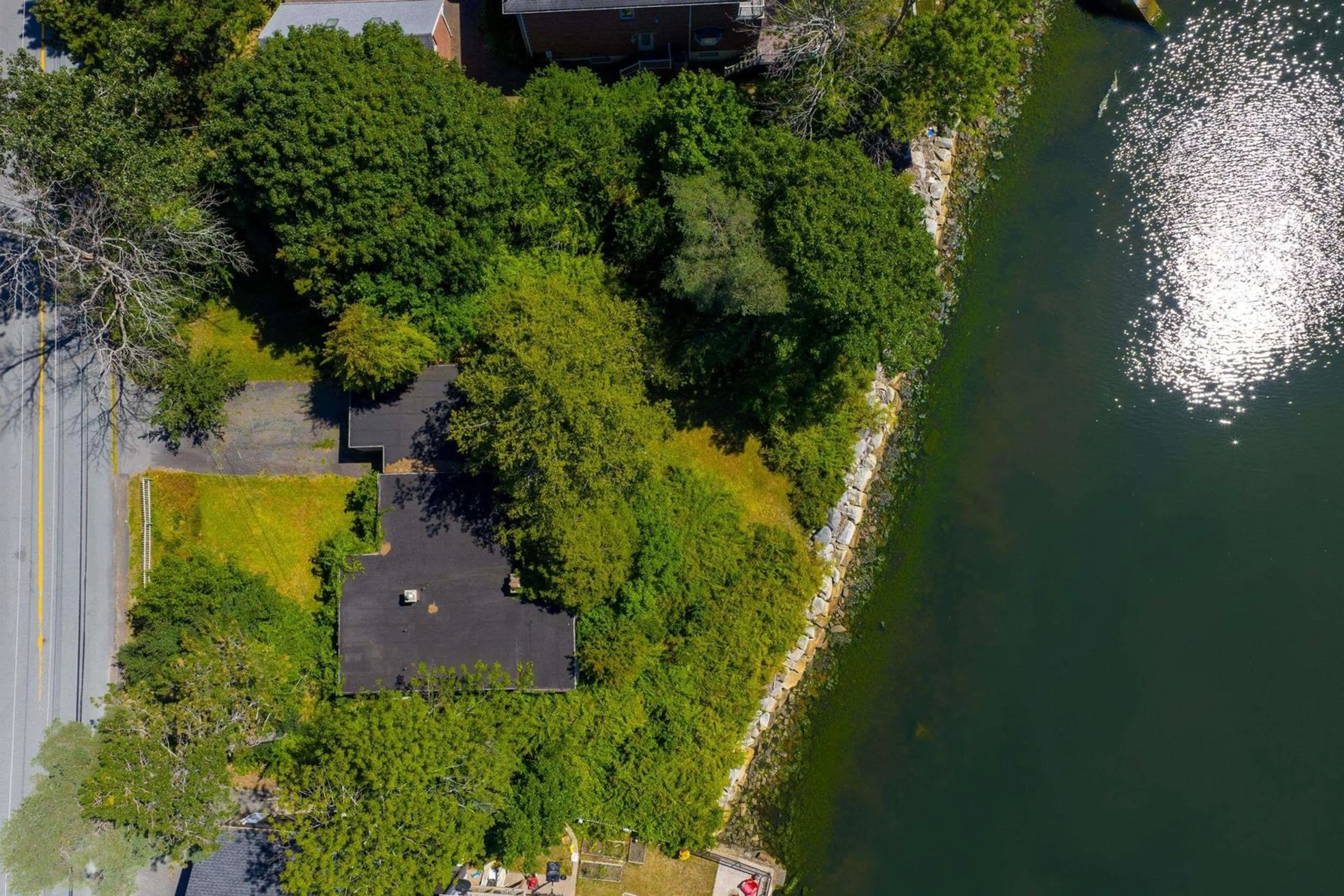 A pic from outside/outdoor area/front of a property/back of a property/a pic from drone, water/lake/river/ocean view for 609 Shore Dr, Bedford Nova Scotia B4A 2E2