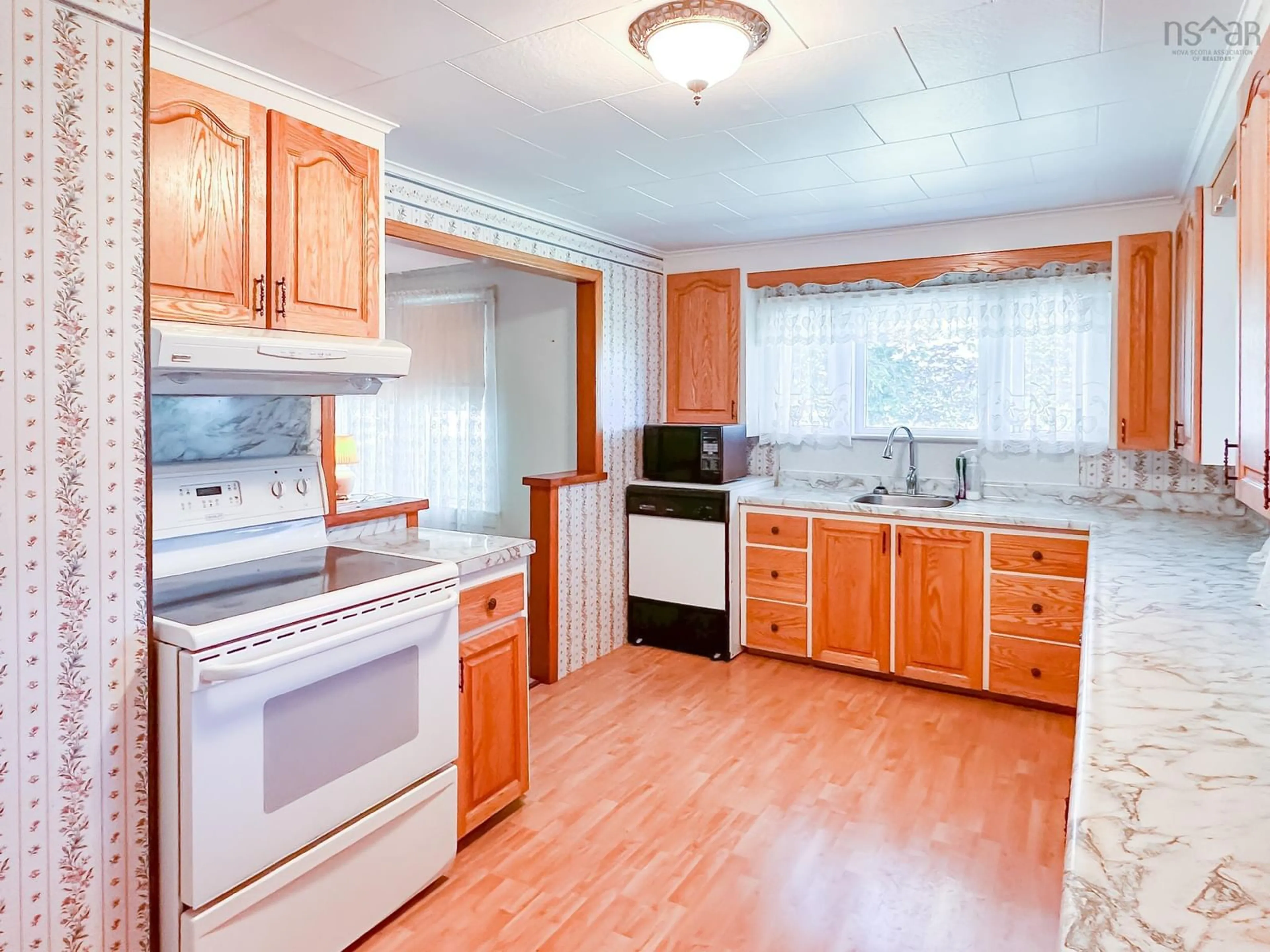 Standard kitchen, wood/laminate floor for 1178 Parker Mountain Rd, Parkers Cove Nova Scotia B0S 1A0