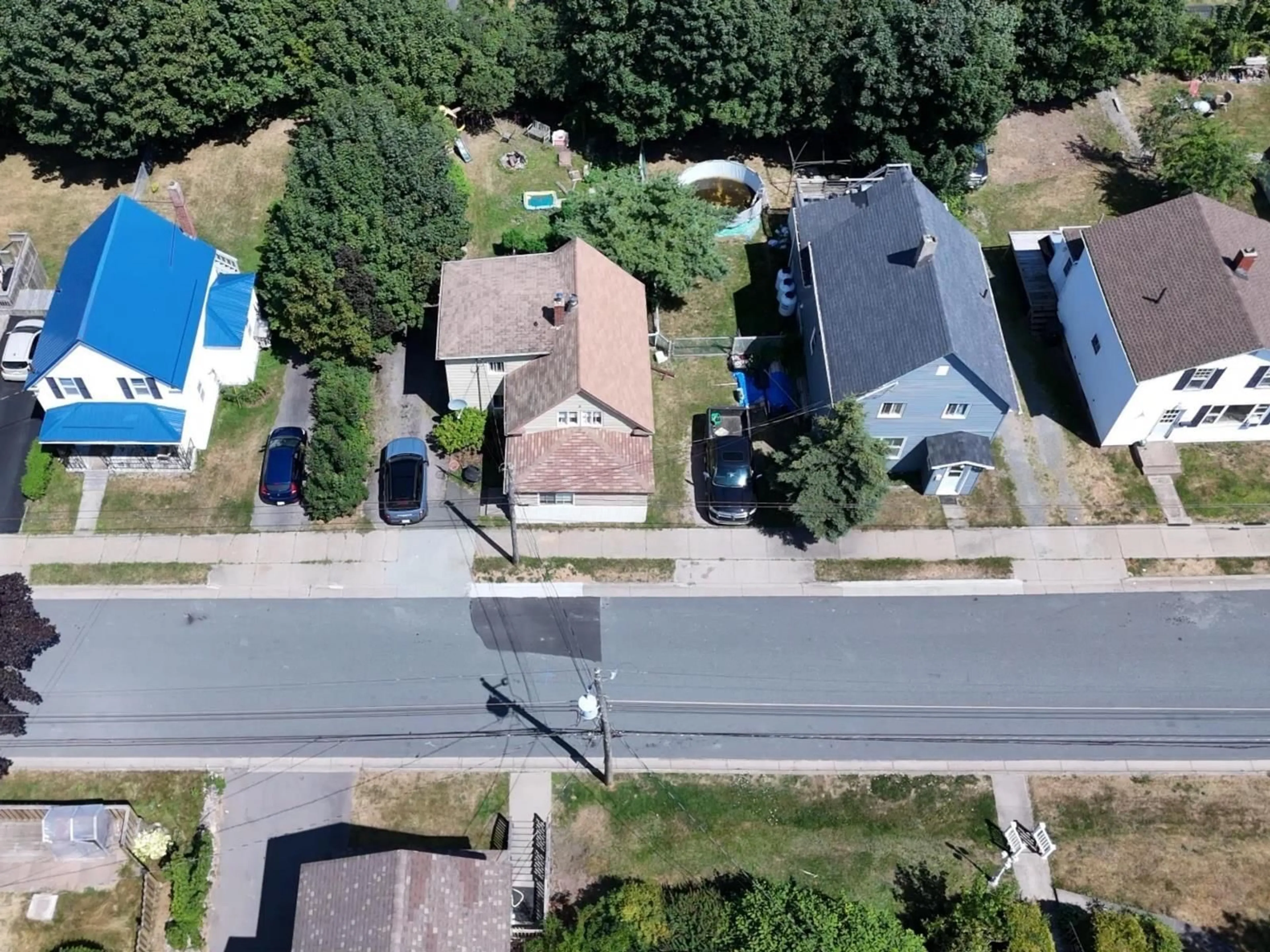 A pic from outside/outdoor area/front of a property/back of a property/a pic from drone, street for 219 Rockdale Ave, Sydney Nova Scotia B1P 1Z8