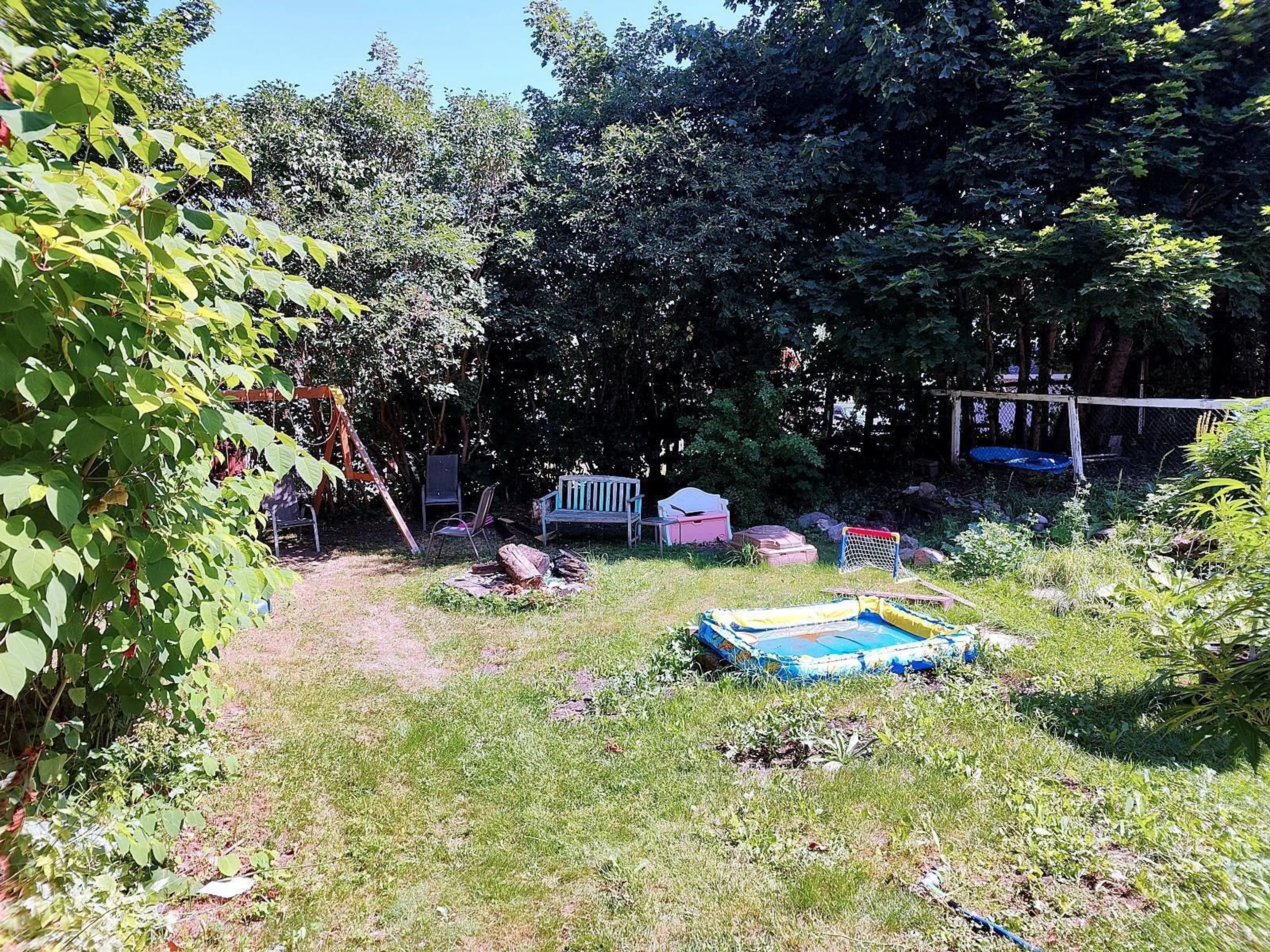 A pic from outside/outdoor area/front of a property/back of a property/a pic from drone, forest/trees view for 219 Rockdale Ave, Sydney Nova Scotia B1P 1Z8