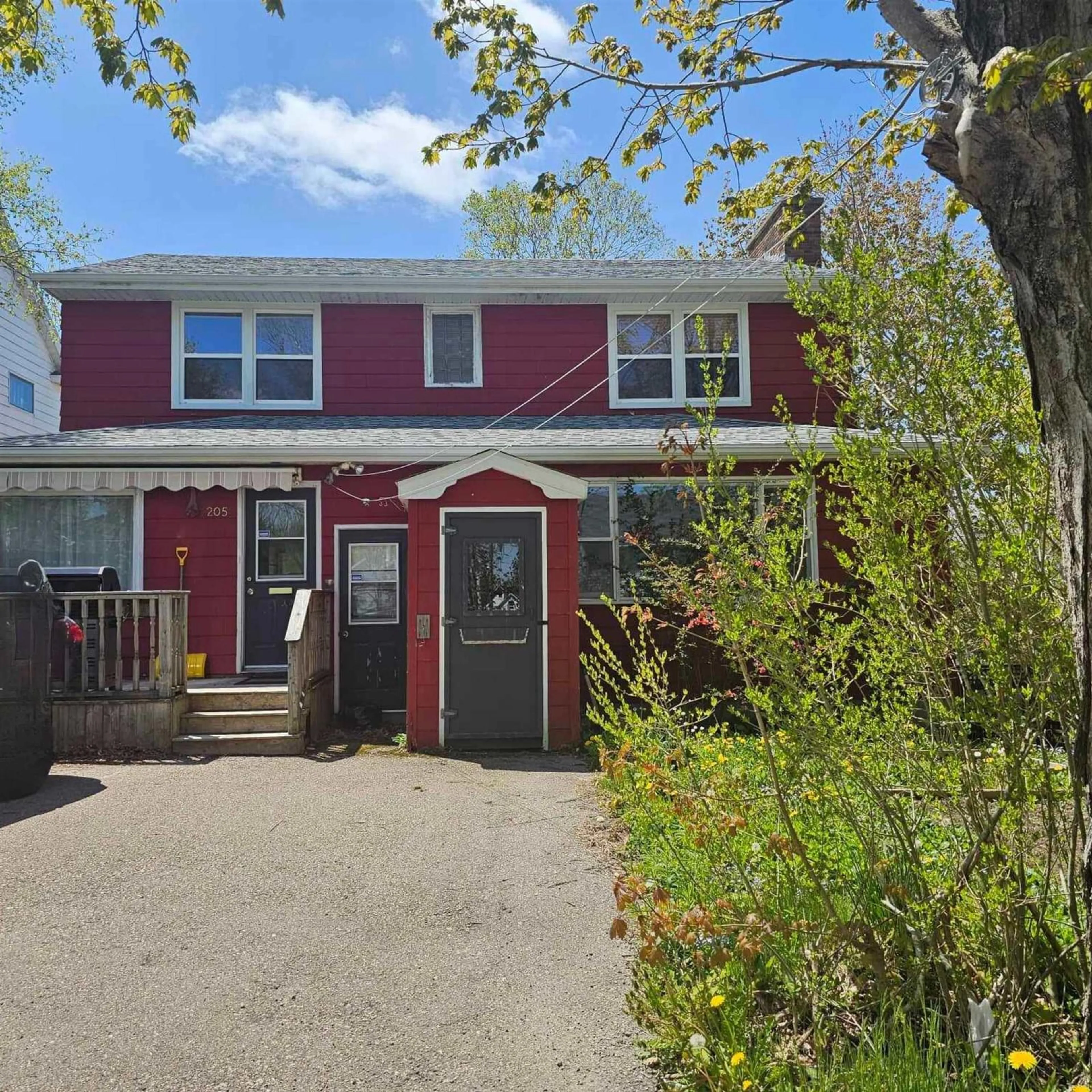 Home with vinyl exterior material, street for 205 South Bentinck St, Sydney Nova Scotia B1P 1X7
