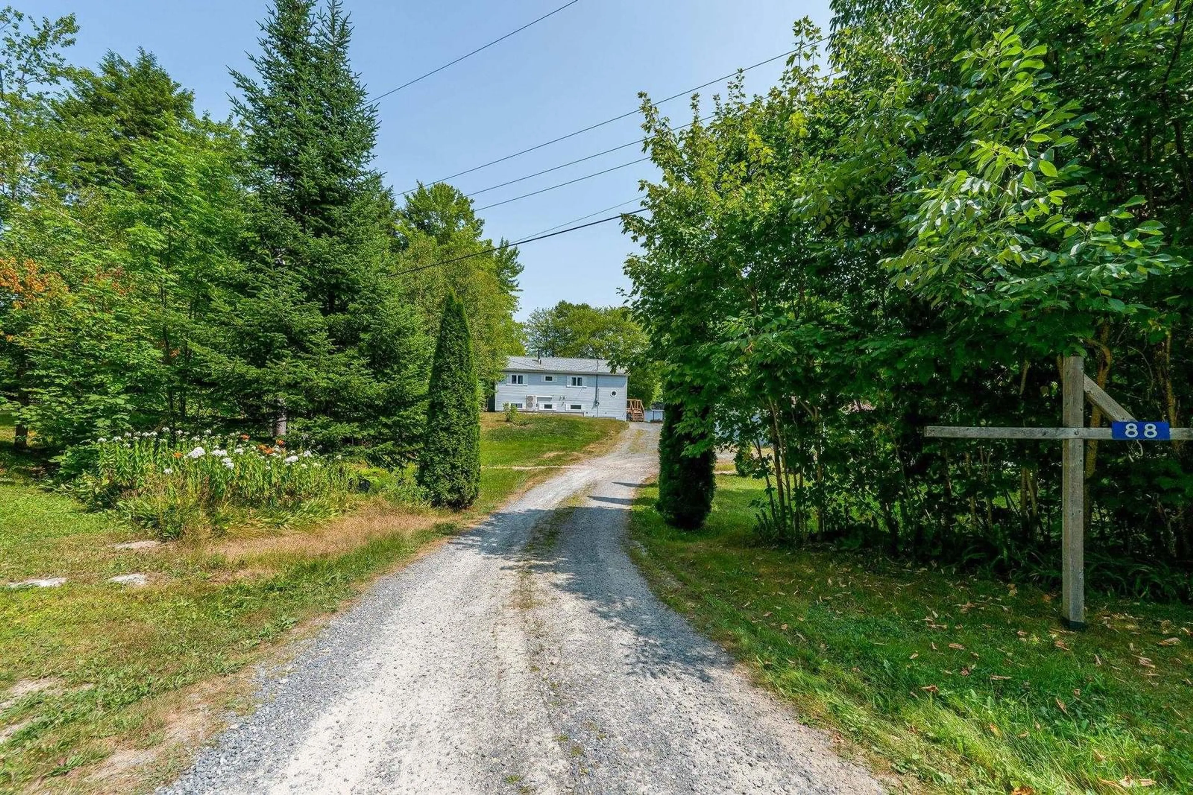 A pic from outside/outdoor area/front of a property/back of a property/a pic from drone, street for 88 Lake Lewis Lane, New Russell Nova Scotia B0J 2M0