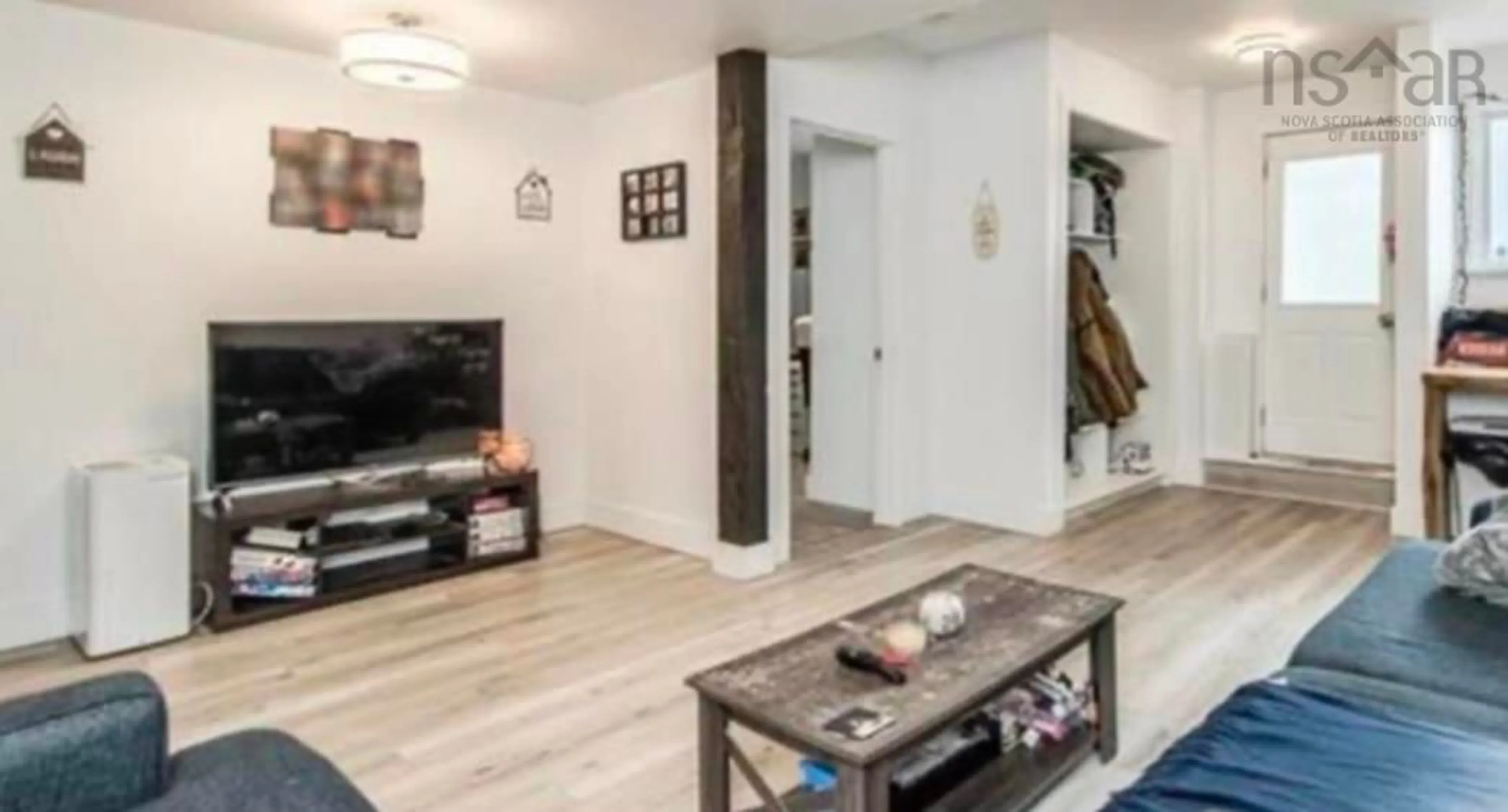 Living room with furniture, wood/laminate floor for 157-159 Crown Dr, Fairmount Nova Scotia B3N 1L2