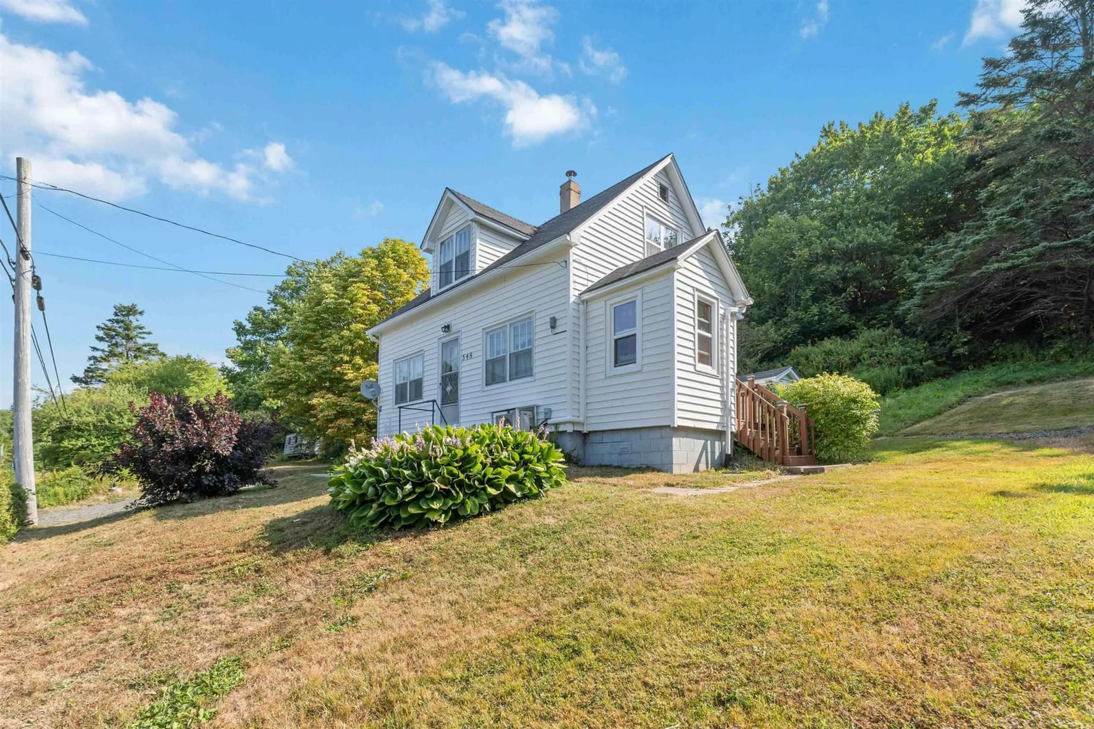 A pic from outside/outdoor area/front of a property/back of a property/a pic from drone, street for 548 Lighthouse Rd, Bay View Nova Scotia B0V 1A0