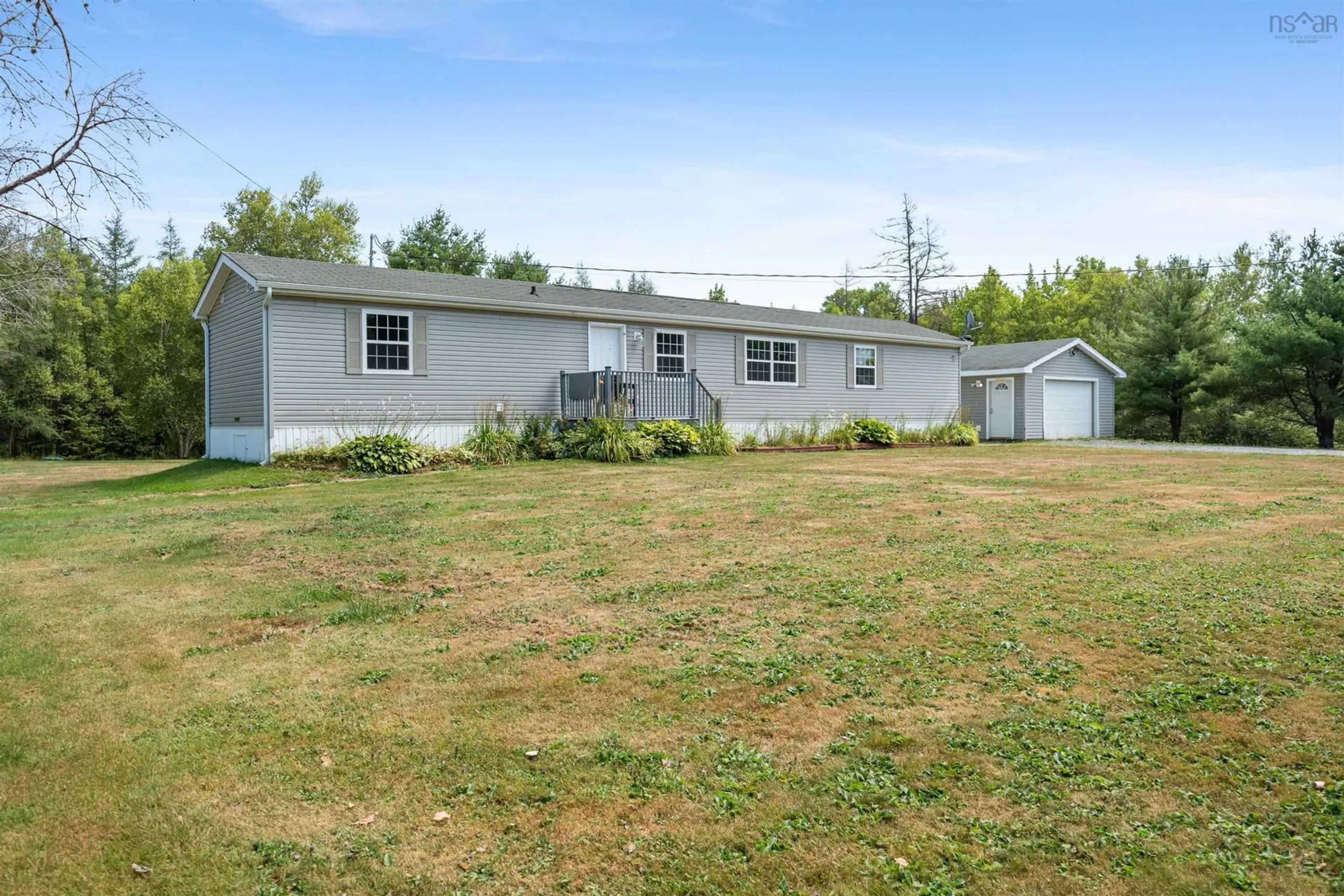A pic from outside/outdoor area/front of a property/back of a property/a pic from drone, unknown for 7600 Highway 354, Kennetcook Nova Scotia B0N 1T0