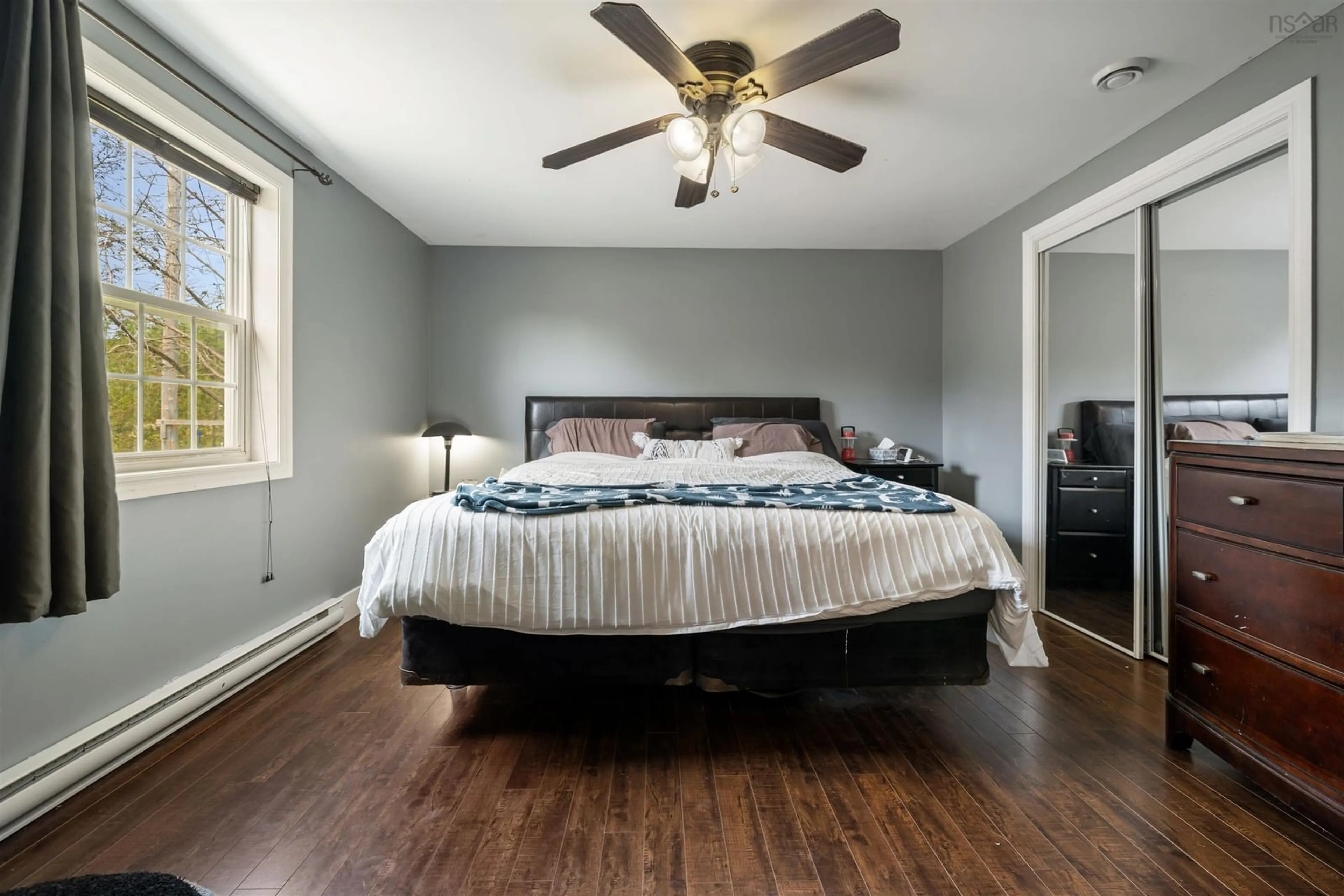 Bedroom with bed, wood/laminate floor for 7600 Highway 354, Kennetcook Nova Scotia B0N 1T0