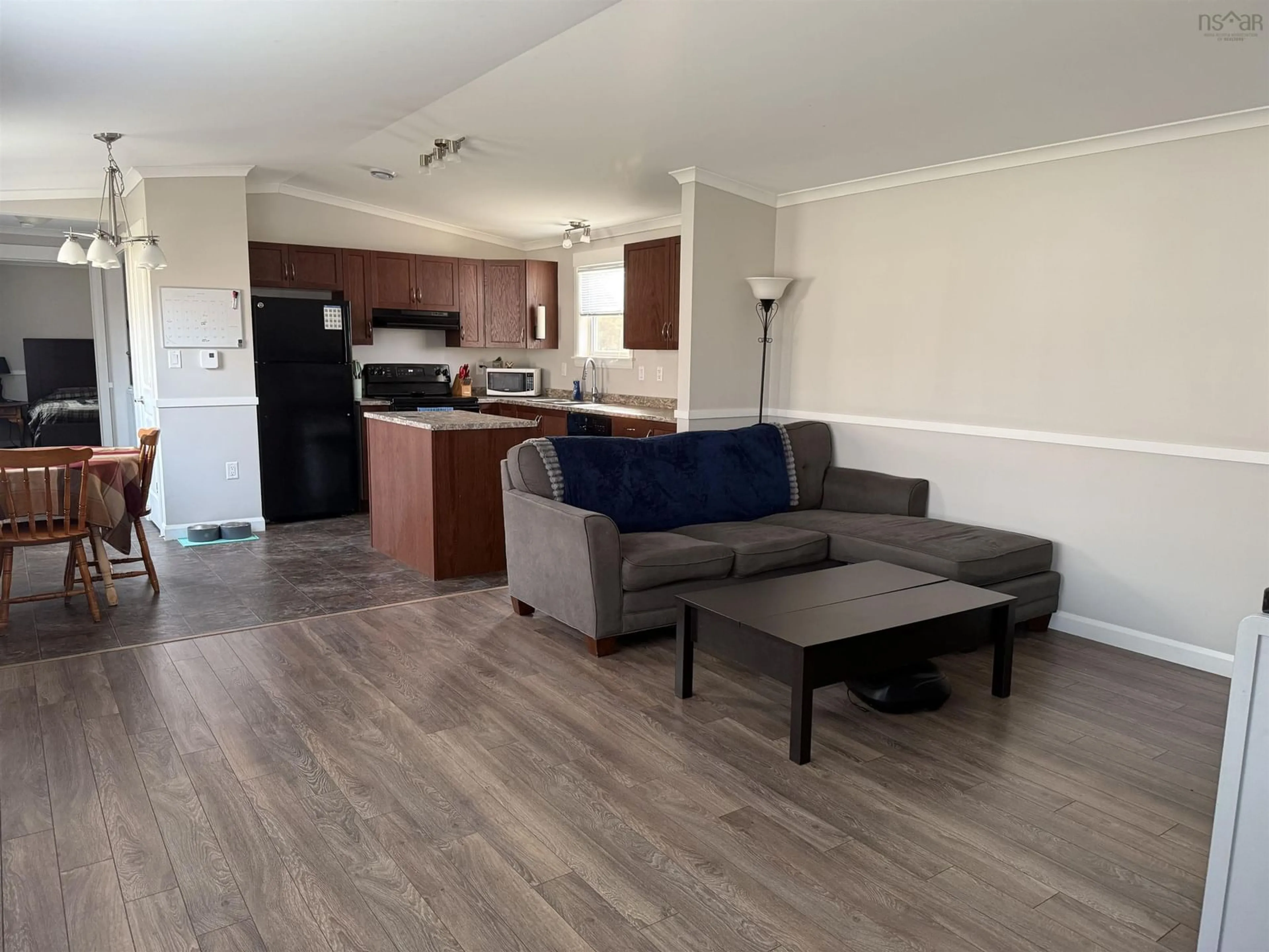 Living room with furniture, wood/laminate floor for 9 High Tide Rd, Stewiacke Nova Scotia B0N 2J0