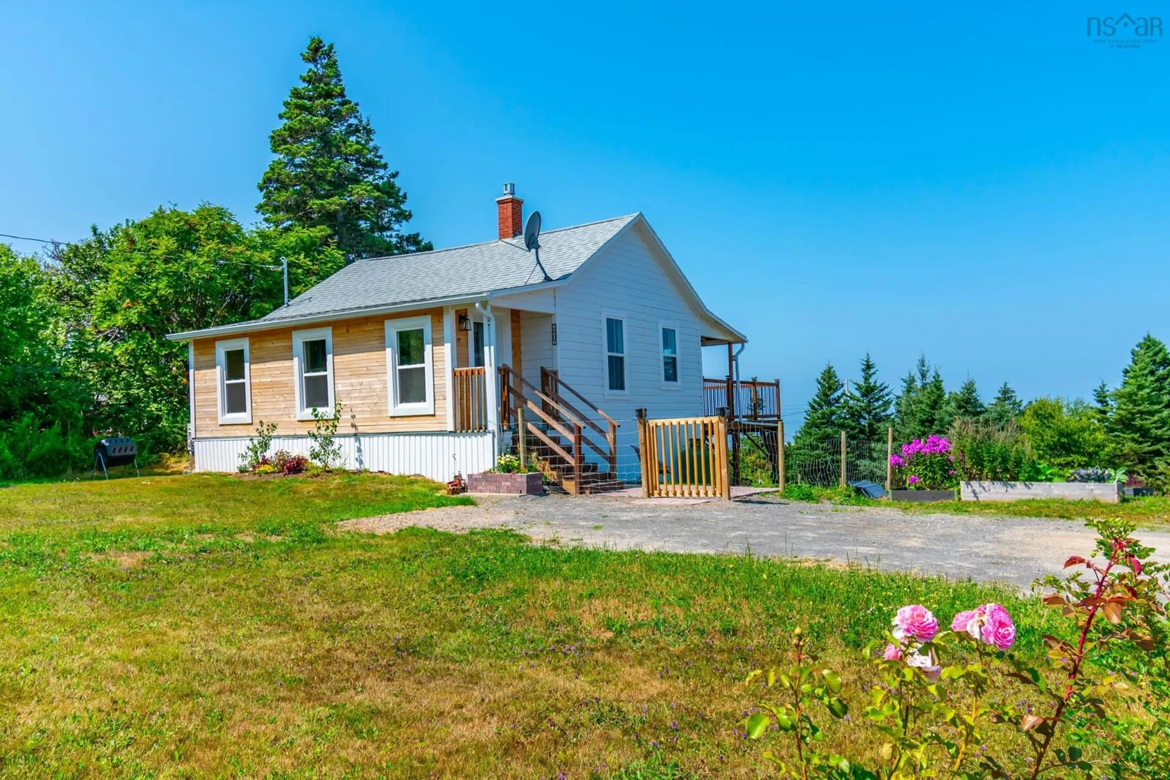 A pic from outside/outdoor area/front of a property/back of a property/a pic from drone, water/lake/river/ocean view for 2807 Highway 362, Margaretsville Nova Scotia B0S 1P0