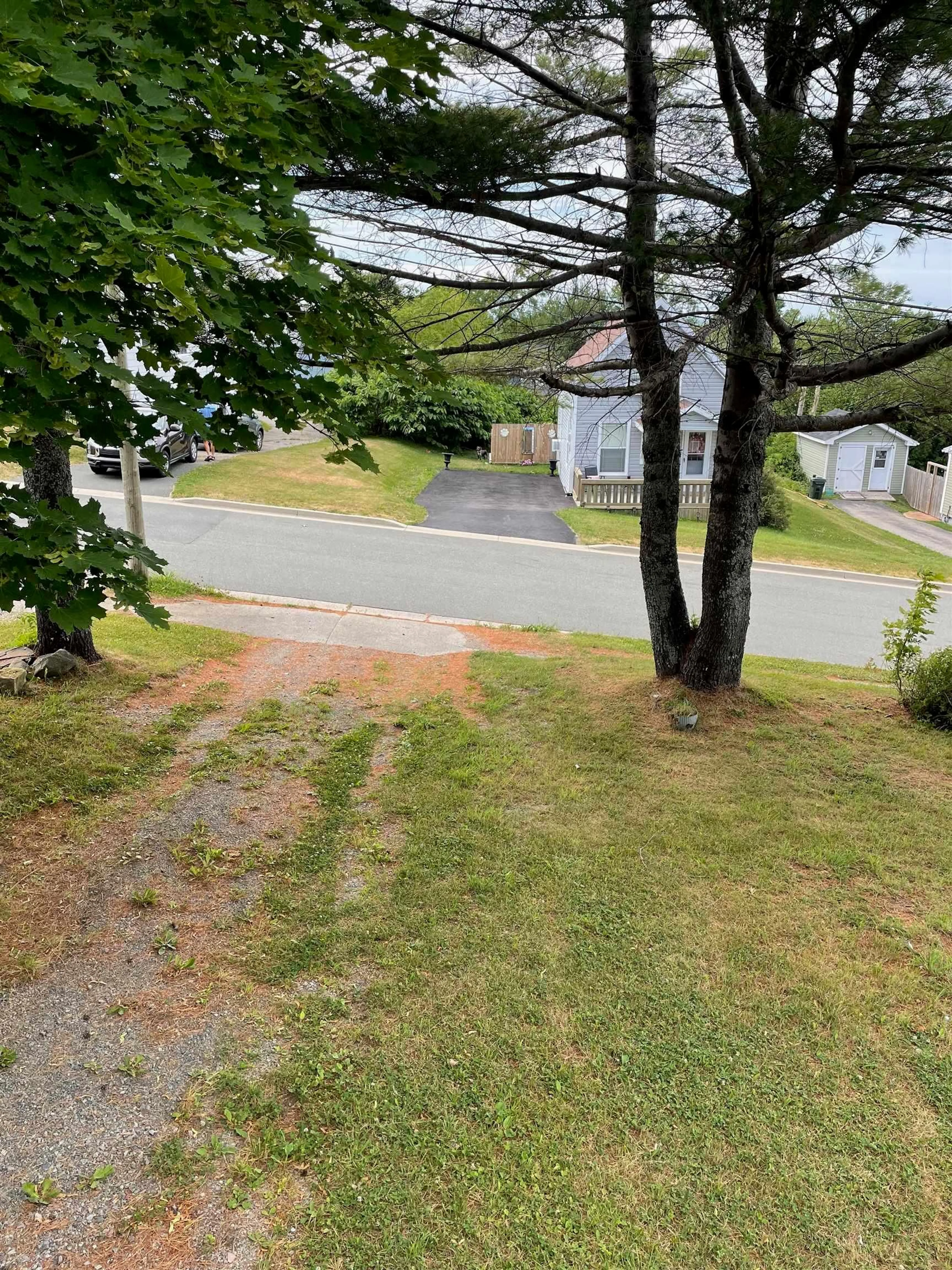 A pic from outside/outdoor area/front of a property/back of a property/a pic from drone, street for 10 Spring Street, Sydney Nova Scotia B1P 3P2