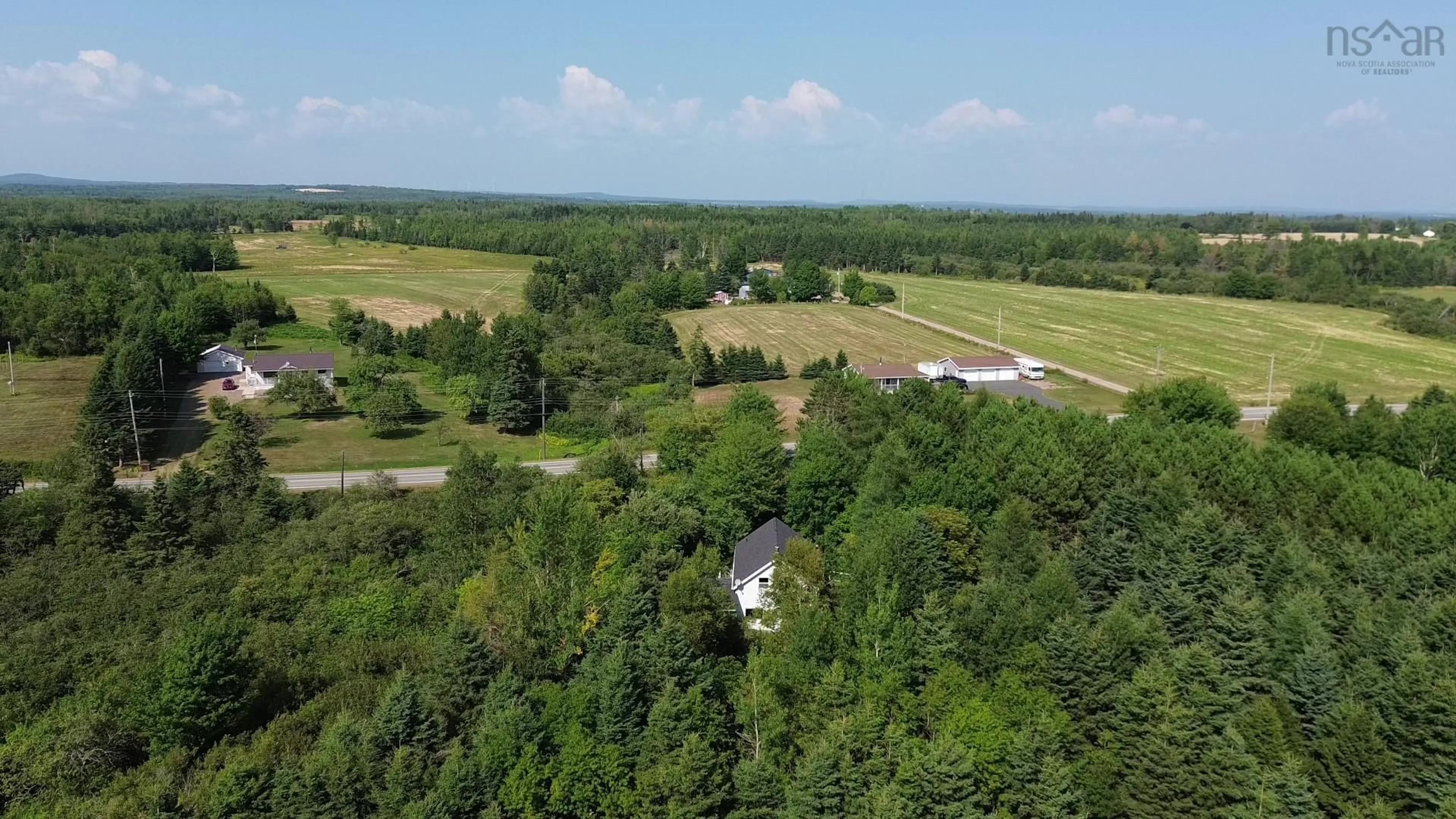 A pic from outside/outdoor area/front of a property/back of a property/a pic from drone, unknown for 7774 Highway 2, Highland Village Nova Scotia B0M 1L0