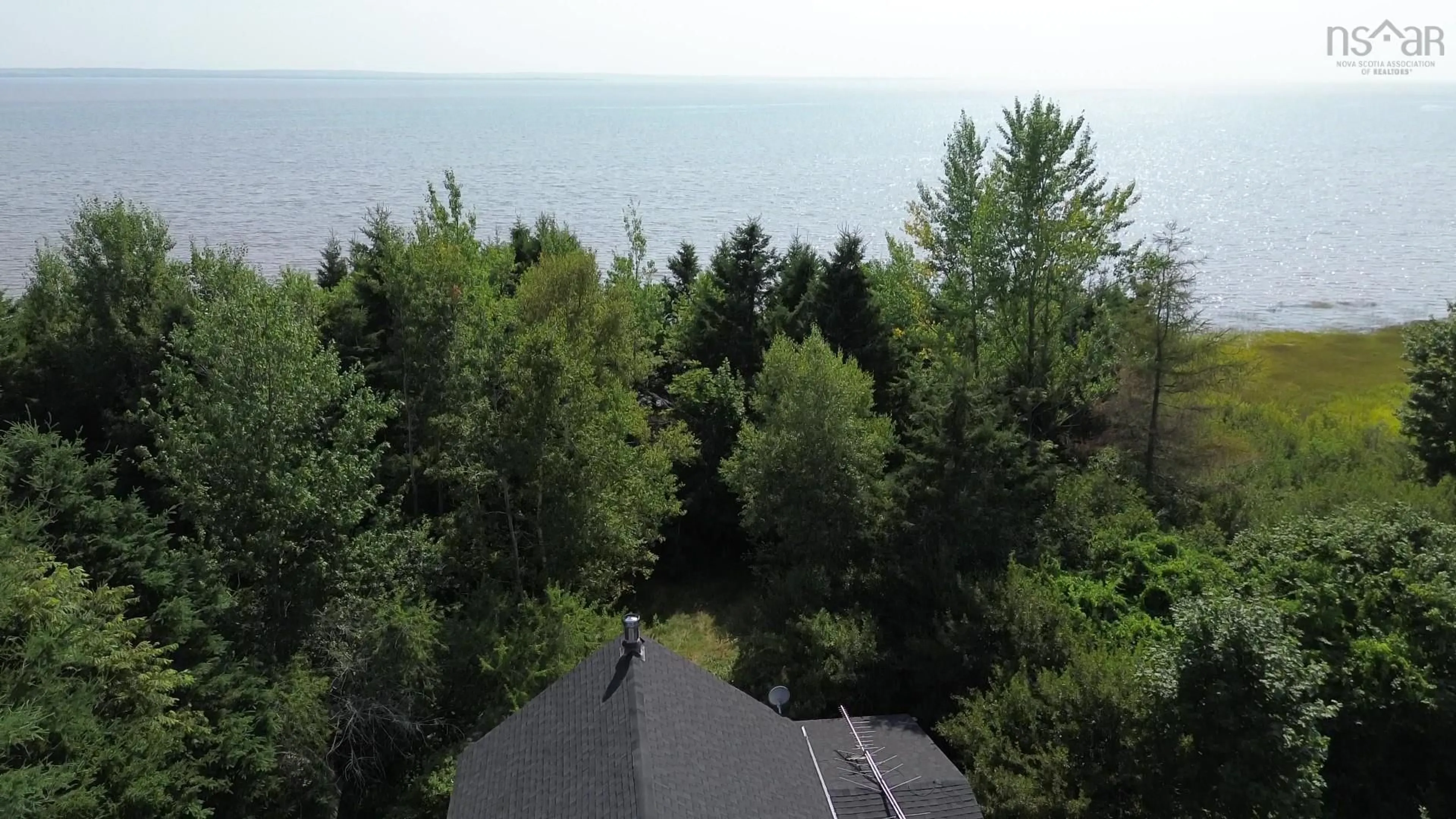 A pic from outside/outdoor area/front of a property/back of a property/a pic from drone, water/lake/river/ocean view for 7774 Highway 2, Highland Village Nova Scotia B0M 1L0