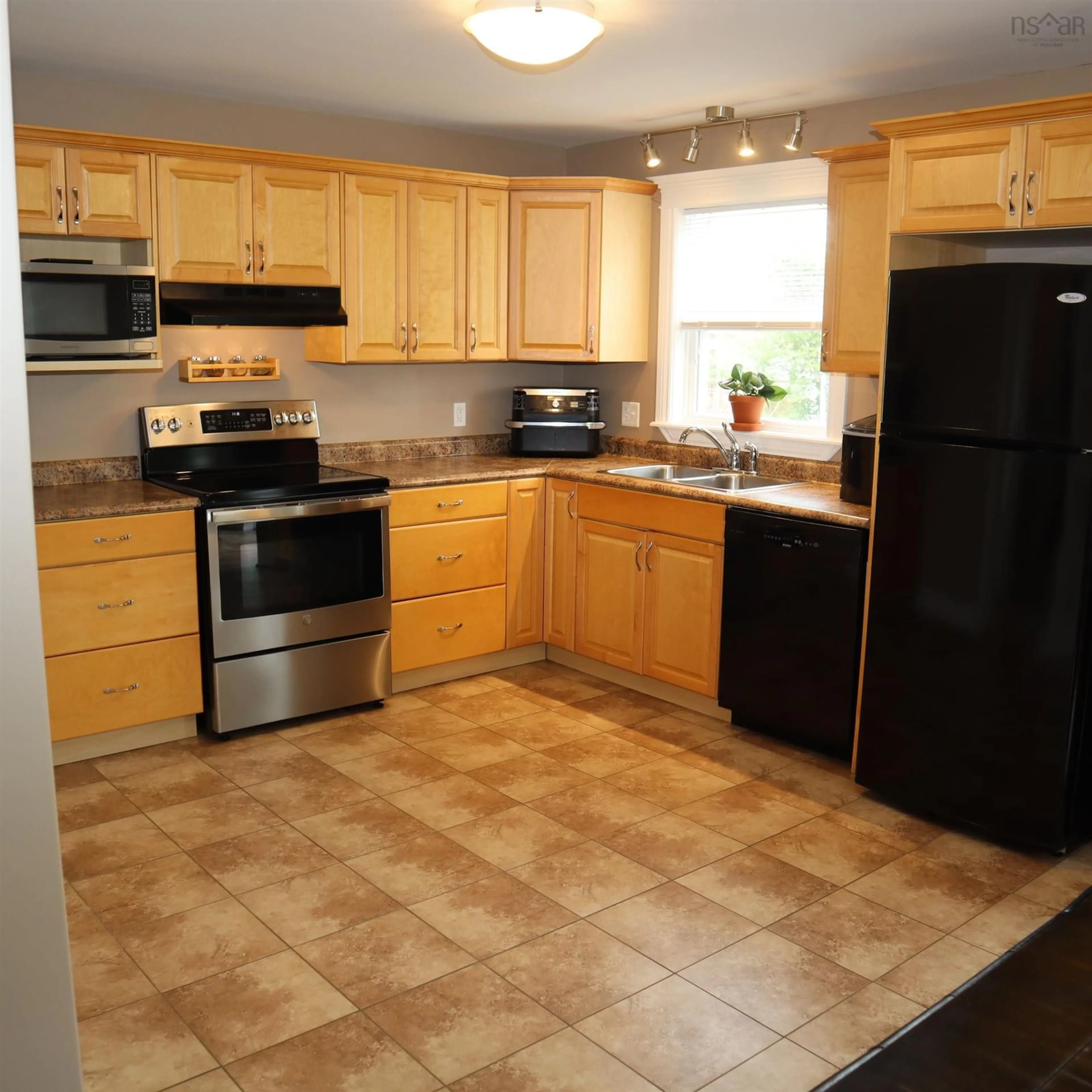 Standard kitchen, ceramic/tile floor for 77 St Clair Ave, Dartmouth Nova Scotia B2X 0B2